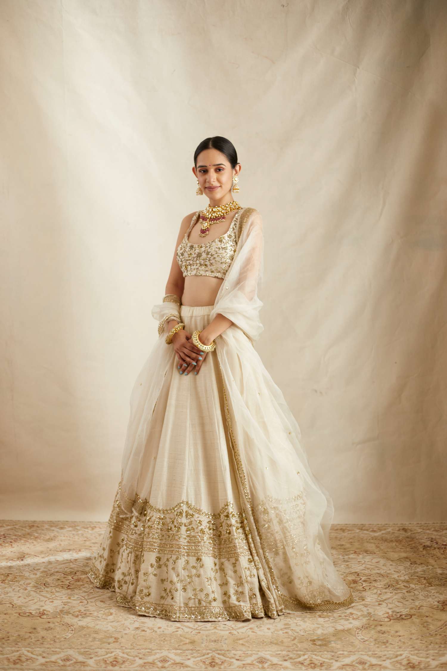 Off White With Gold Work Lehenga Set