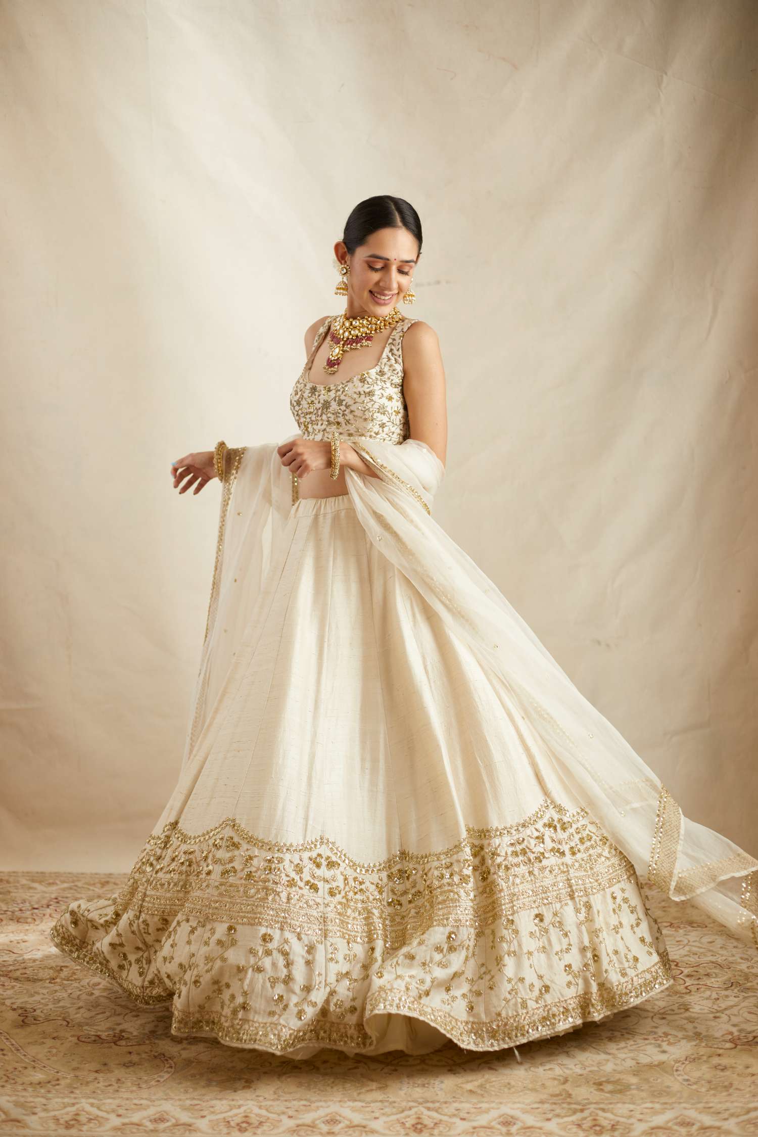 Off White With Gold Work Lehenga Set