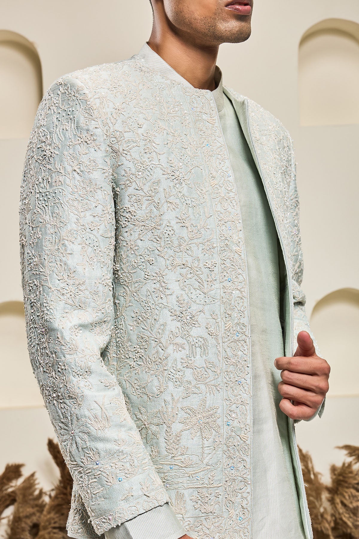 Iceblue open bandhgala 
with thread sequins & pearl
work