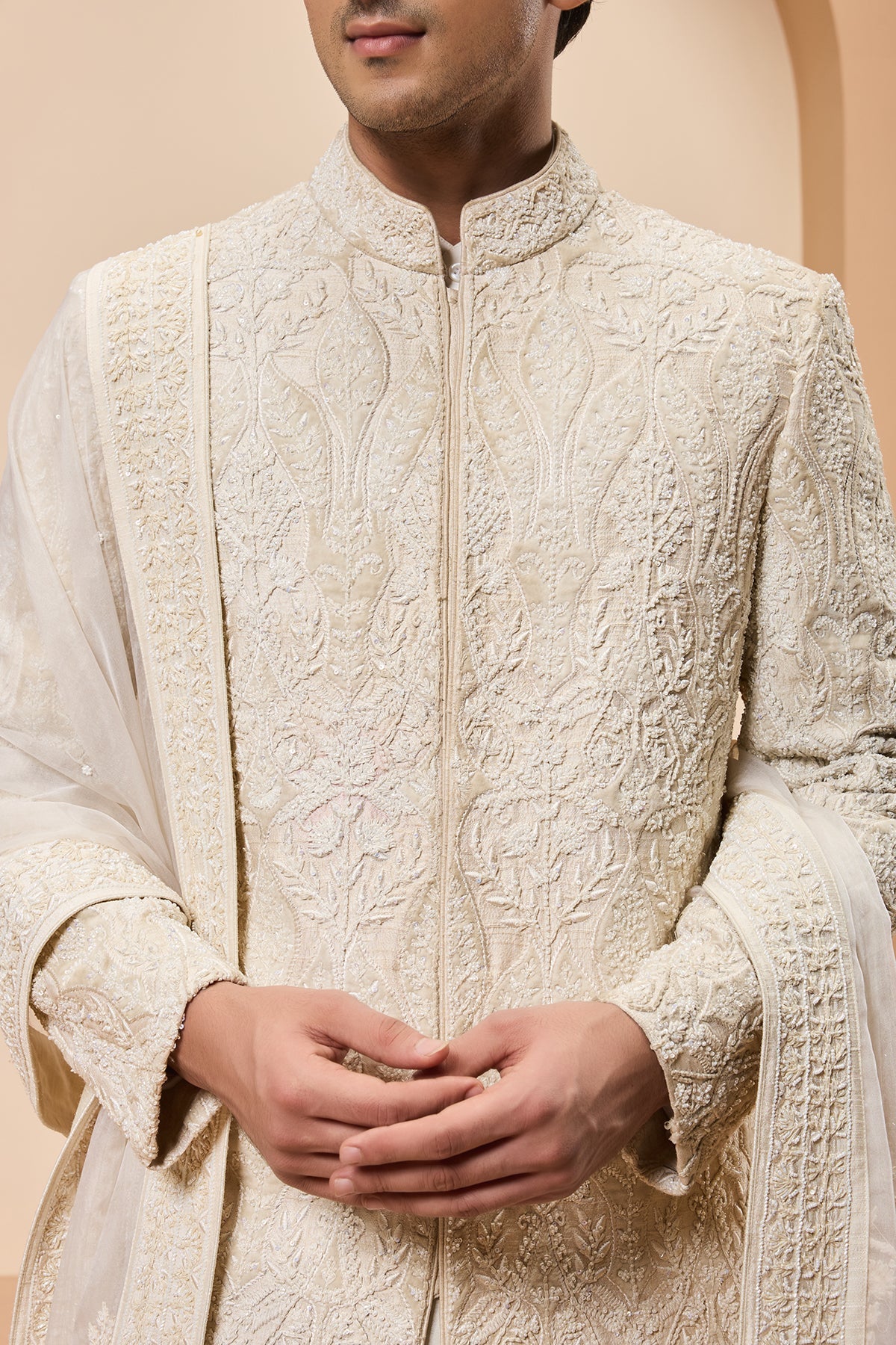 Ivory sherwani detailing with pearl sequins and aplic work