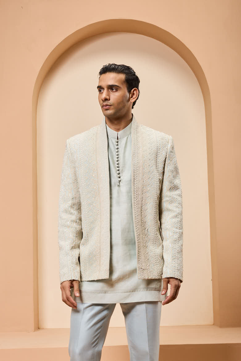 Powder blue open bandhgala 
with thread sequins & pearl
work