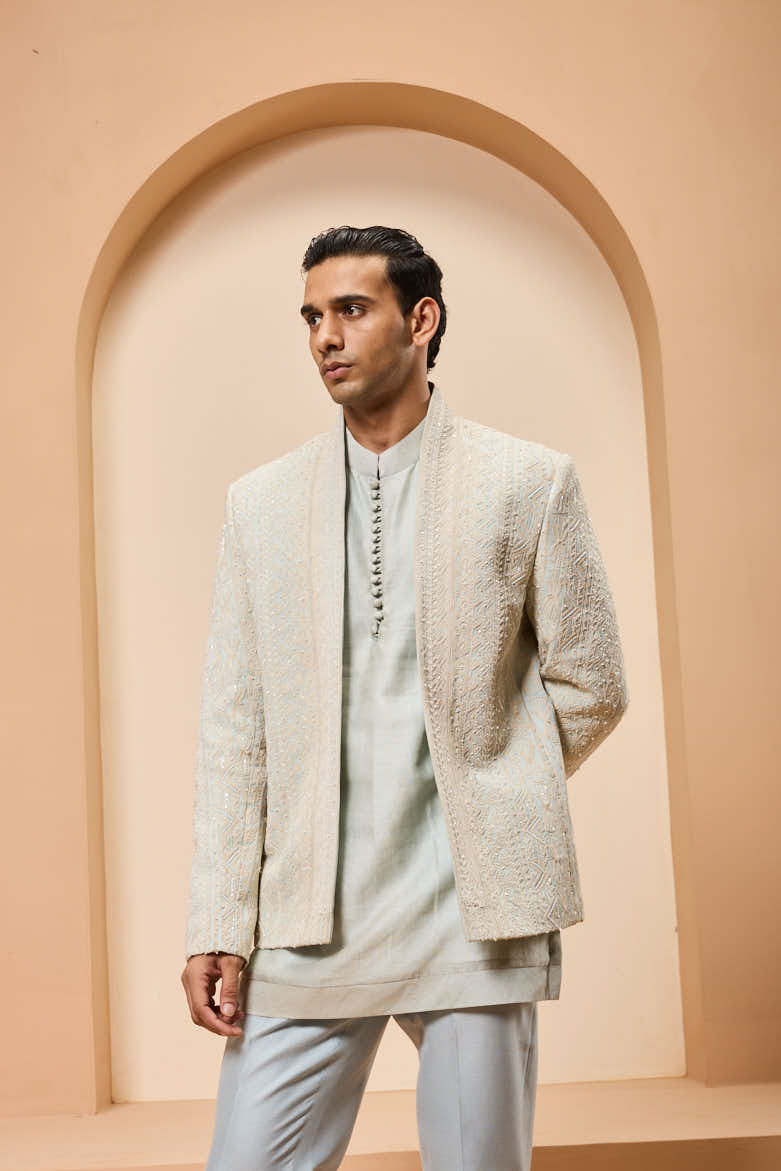 Powder blue open bandhgala 
with thread sequins & pearl
work