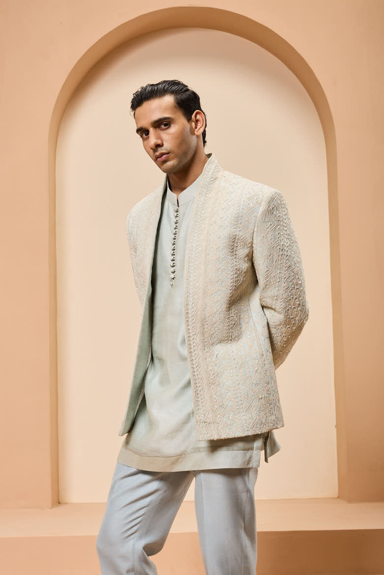 Powder blue open bandhgala 
with thread sequins & pearl
work