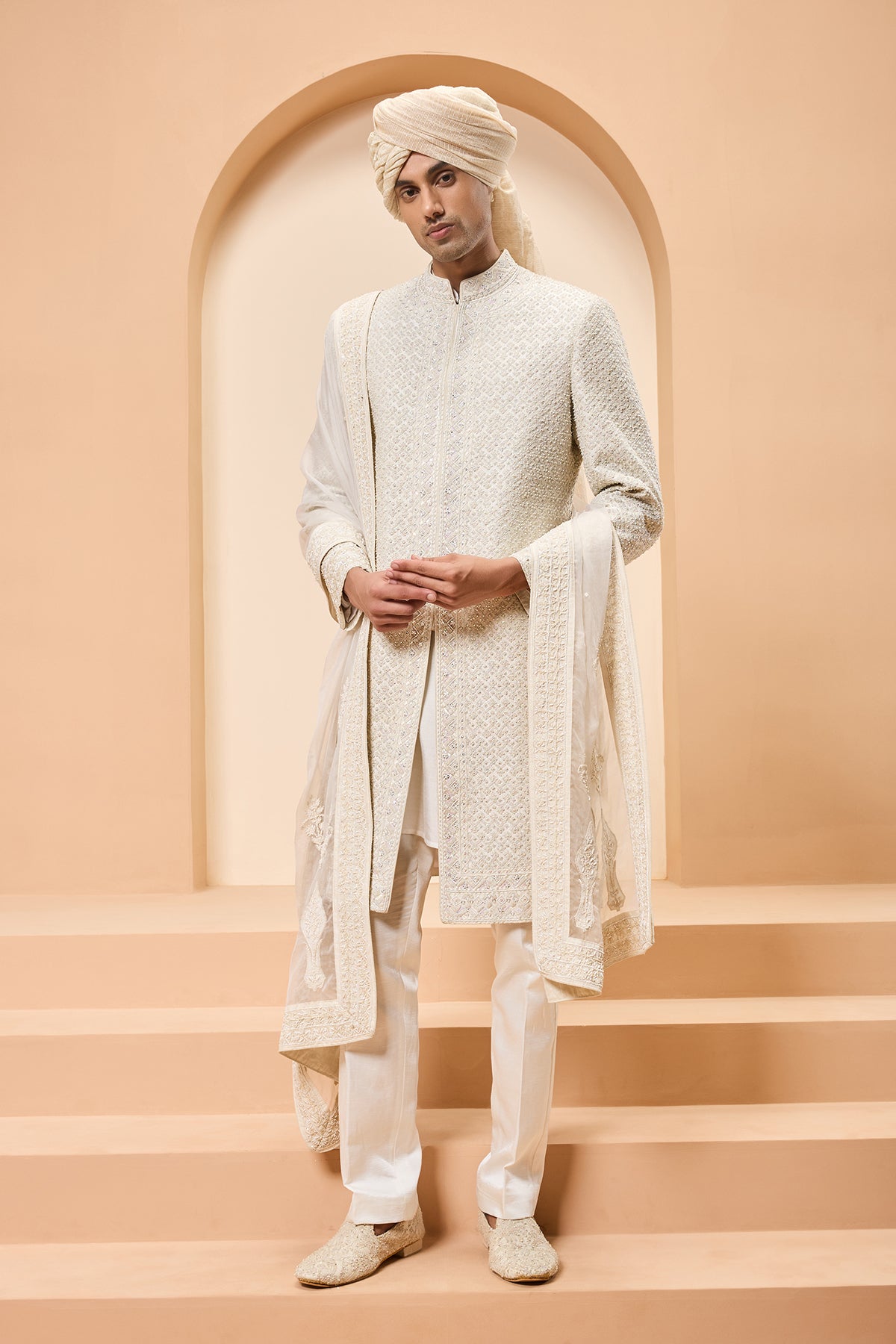 Ivory sherwani detailing with pearl rainbow sequins and thread work