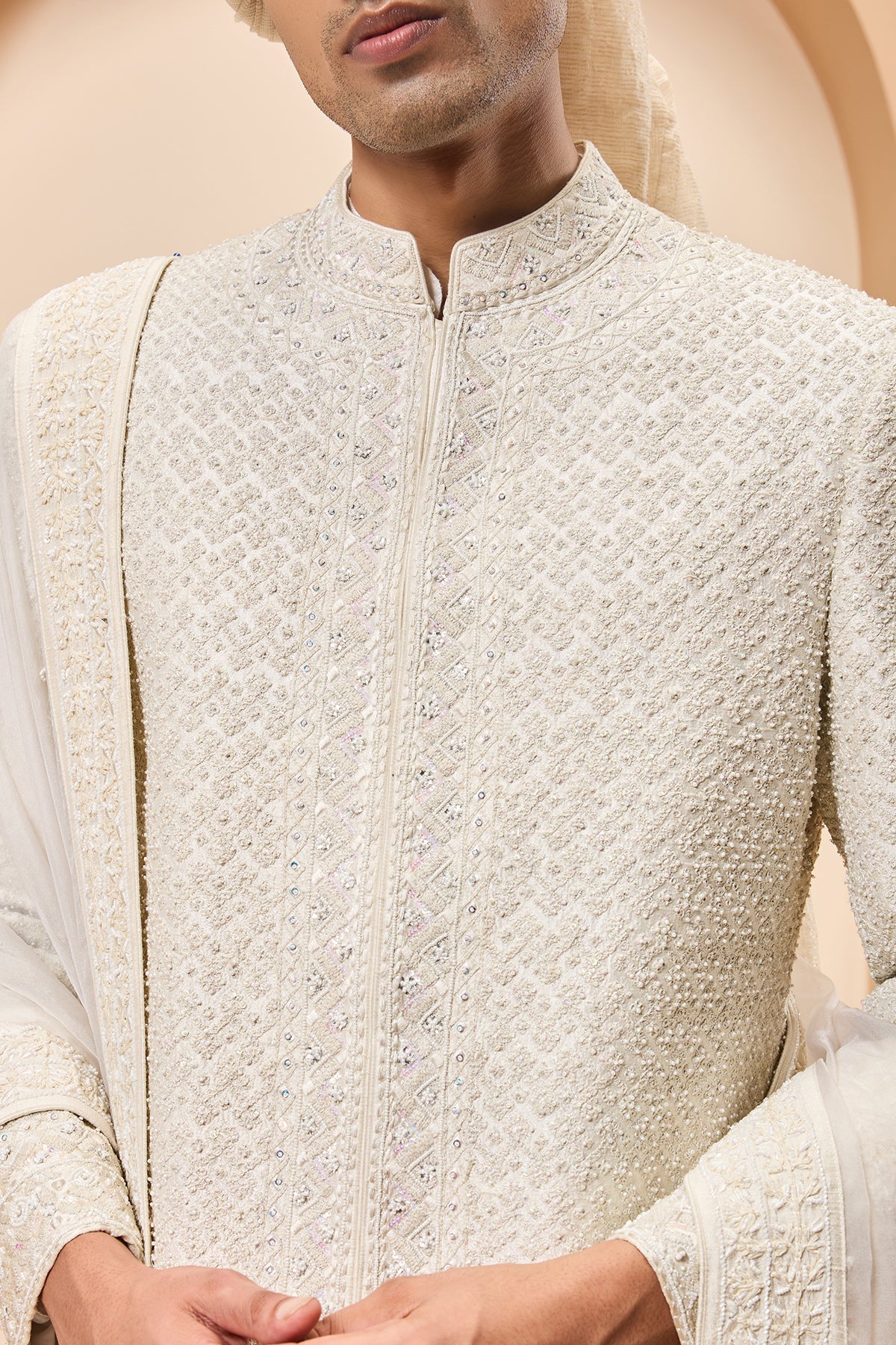 Ivory sherwani detailing with pearl rainbow sequins and thread work