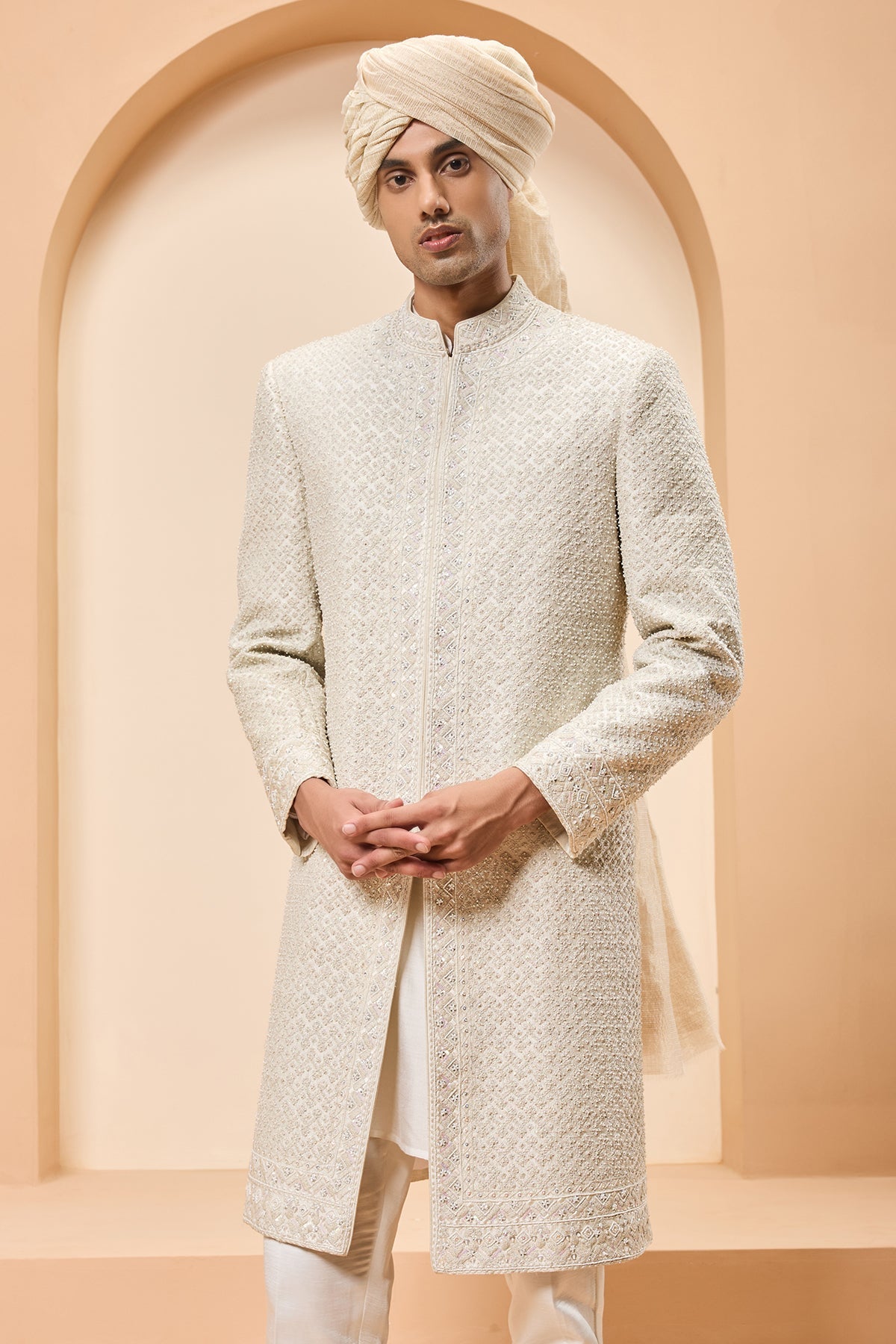 Ivory sherwani detailing with pearl rainbow sequins and thread work