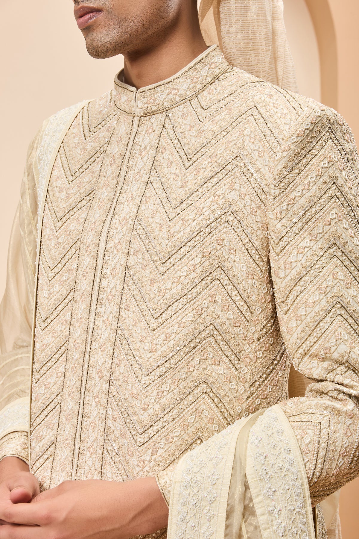 Ivory gold sherwani detailing with zardozi pearl sequins and thread work