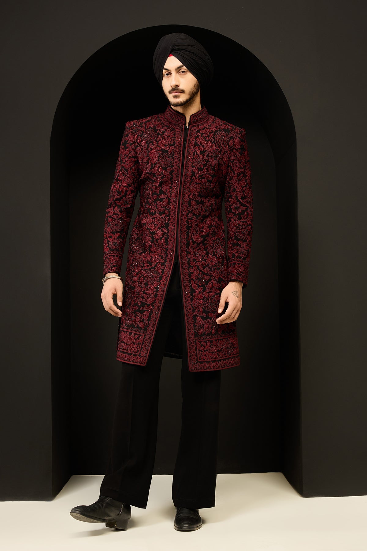 Black indo Western highlighting with sequins pearls and wine thread work