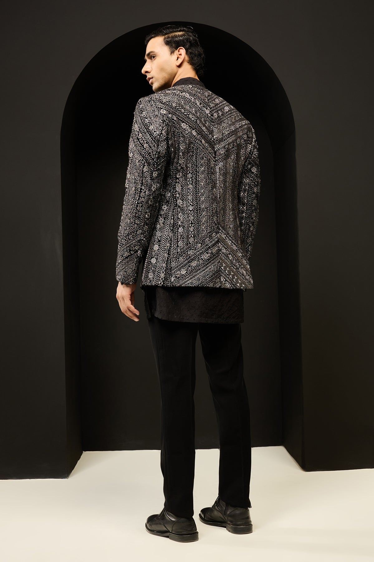 Black open bandhgala 
with silver zari sequins & pearl
work