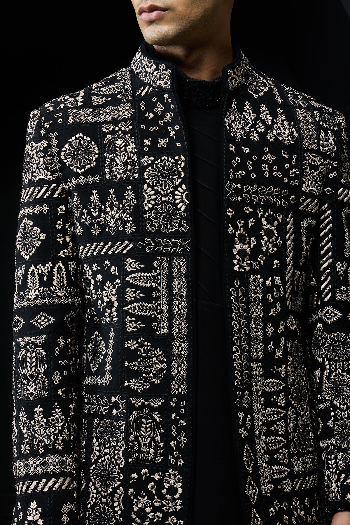 Black open bandhgala 
with thread sequins & pearl
work