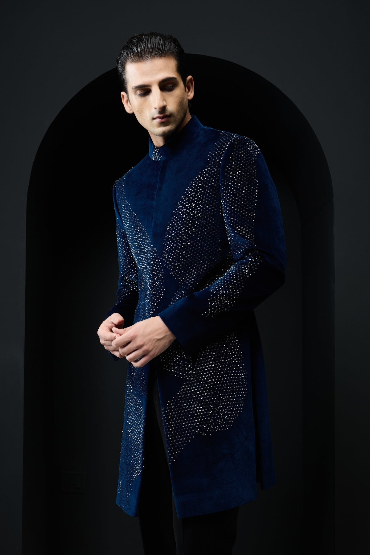 Teal blue Indo Western highlighted with sequins and pearls