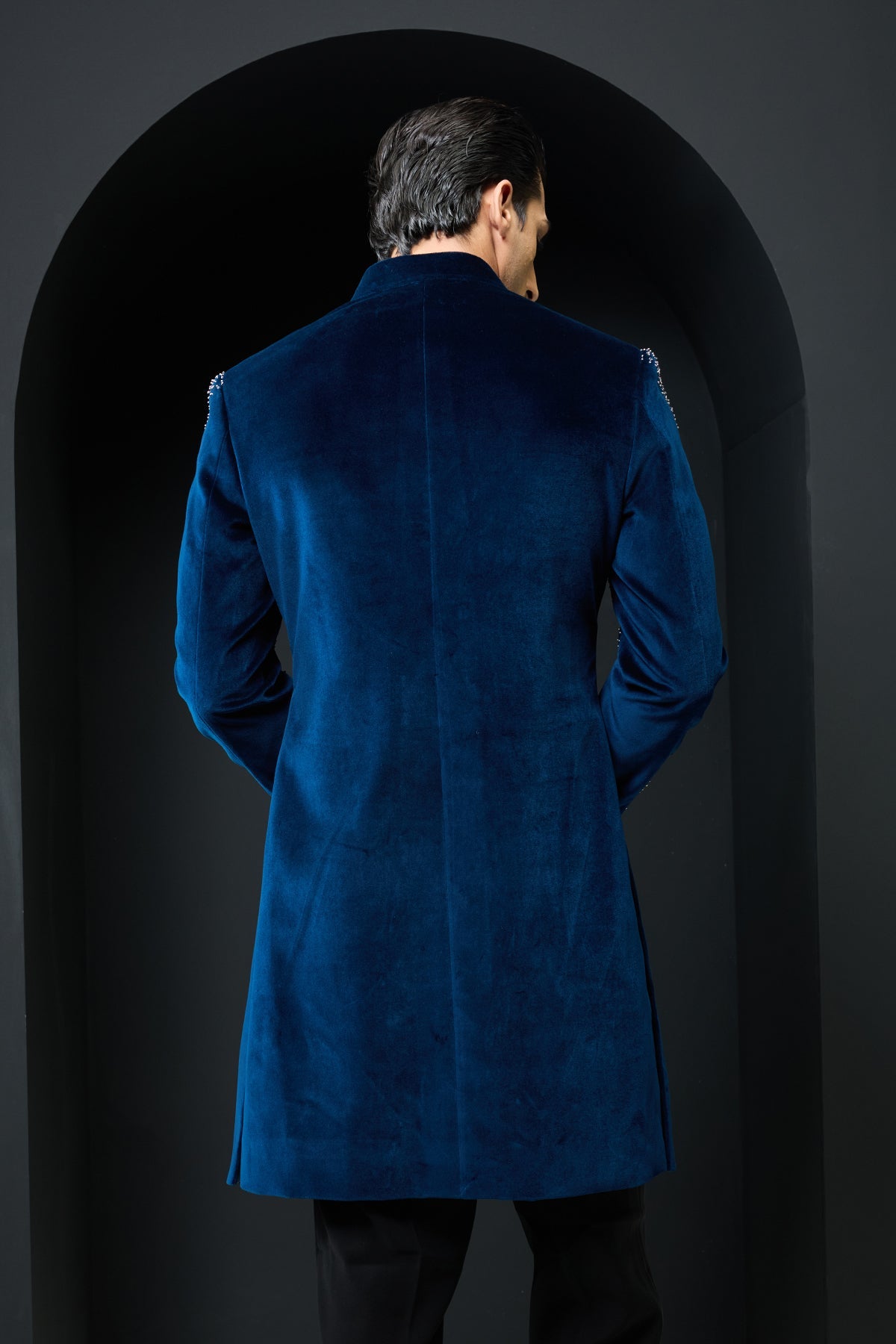 Teal blue Indo Western highlighted with sequins and pearls