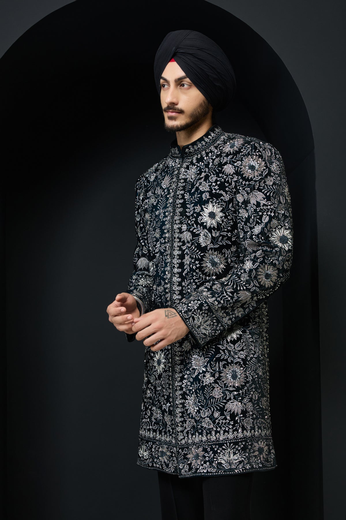 Teal Indo Western highlighted with pearl sequins cutdana and spring thread work