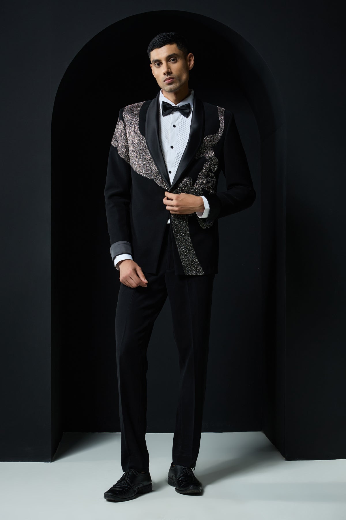 Black tuxedo highlighted with silver zari cutdana and peals