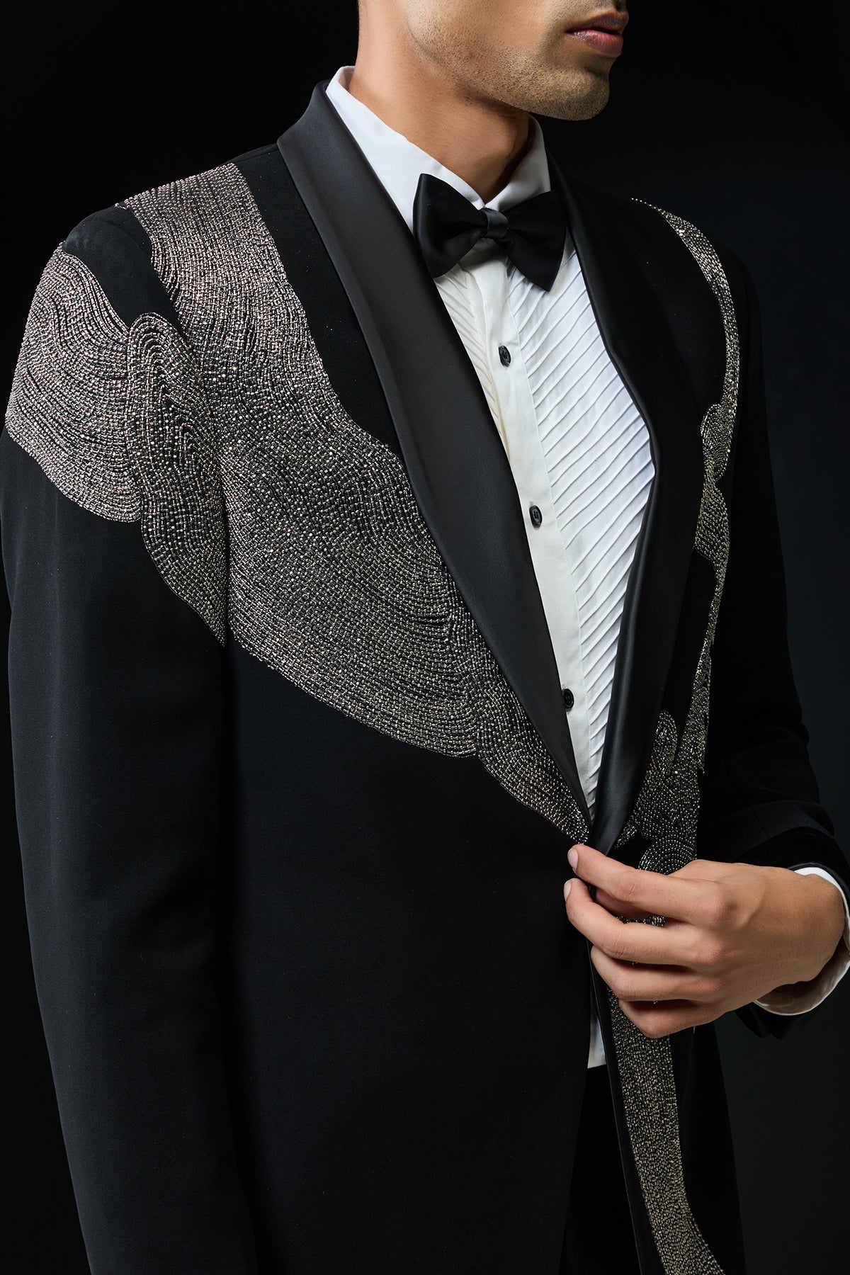Black tuxedo highlighted with silver zari cutdana and peals
