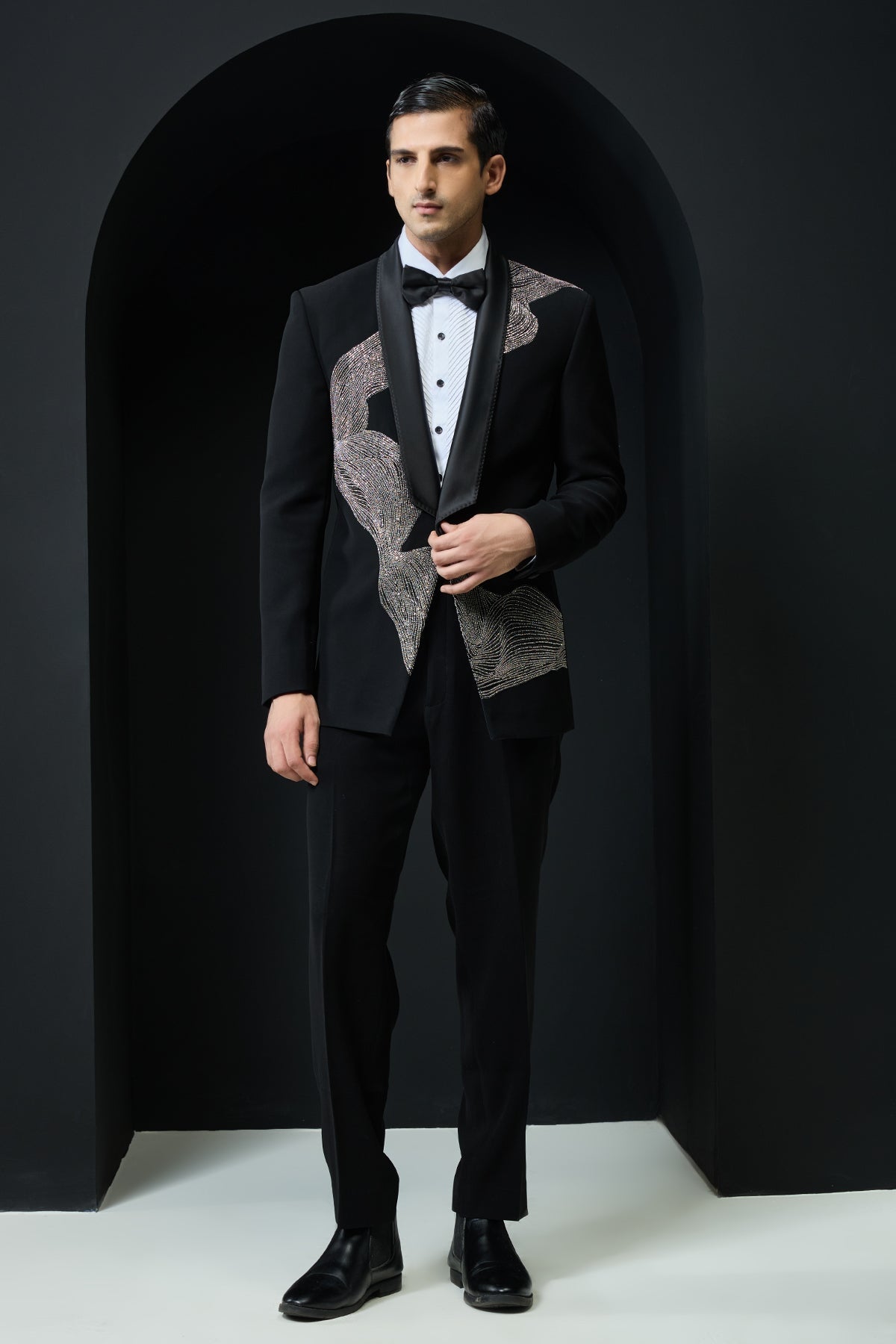 Black tuxedo highlighted with silver zari cutdana and peals