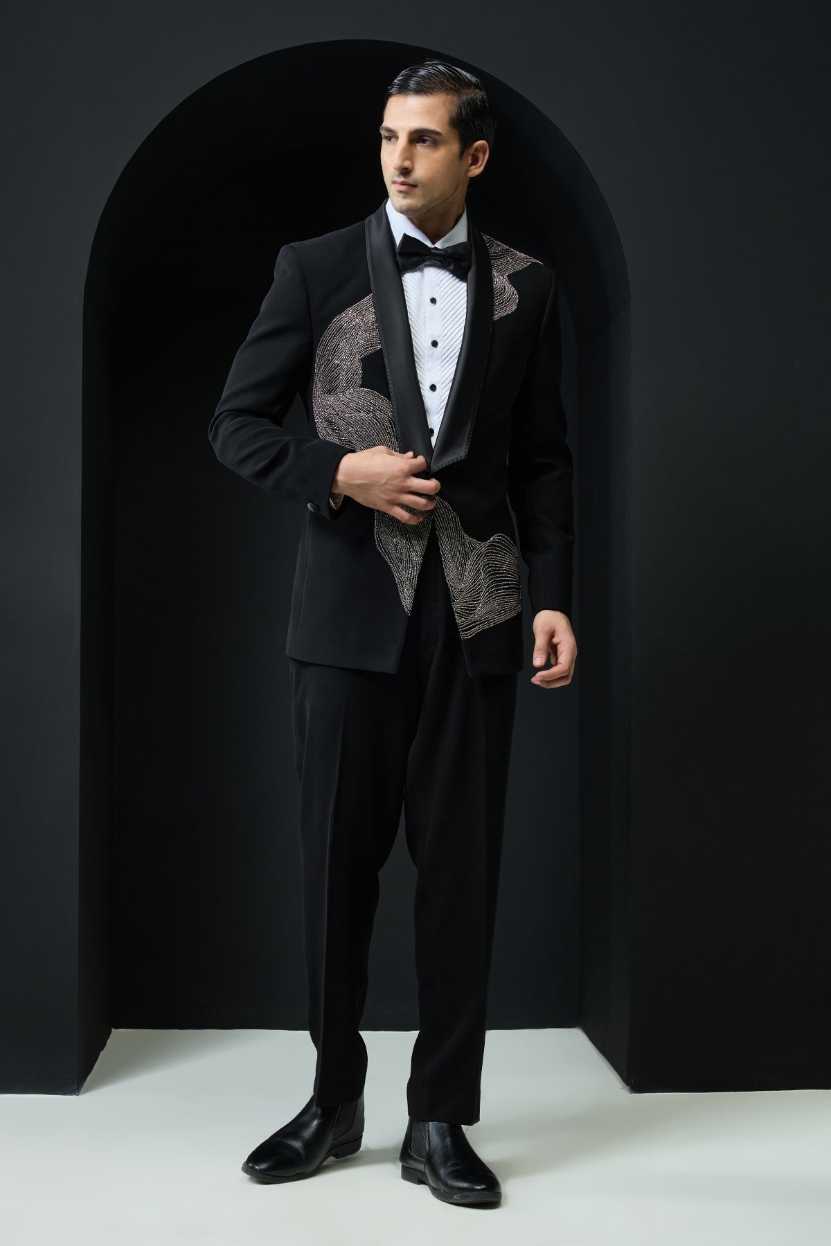 Black tuxedo highlighted with silver zari cutdana and peals