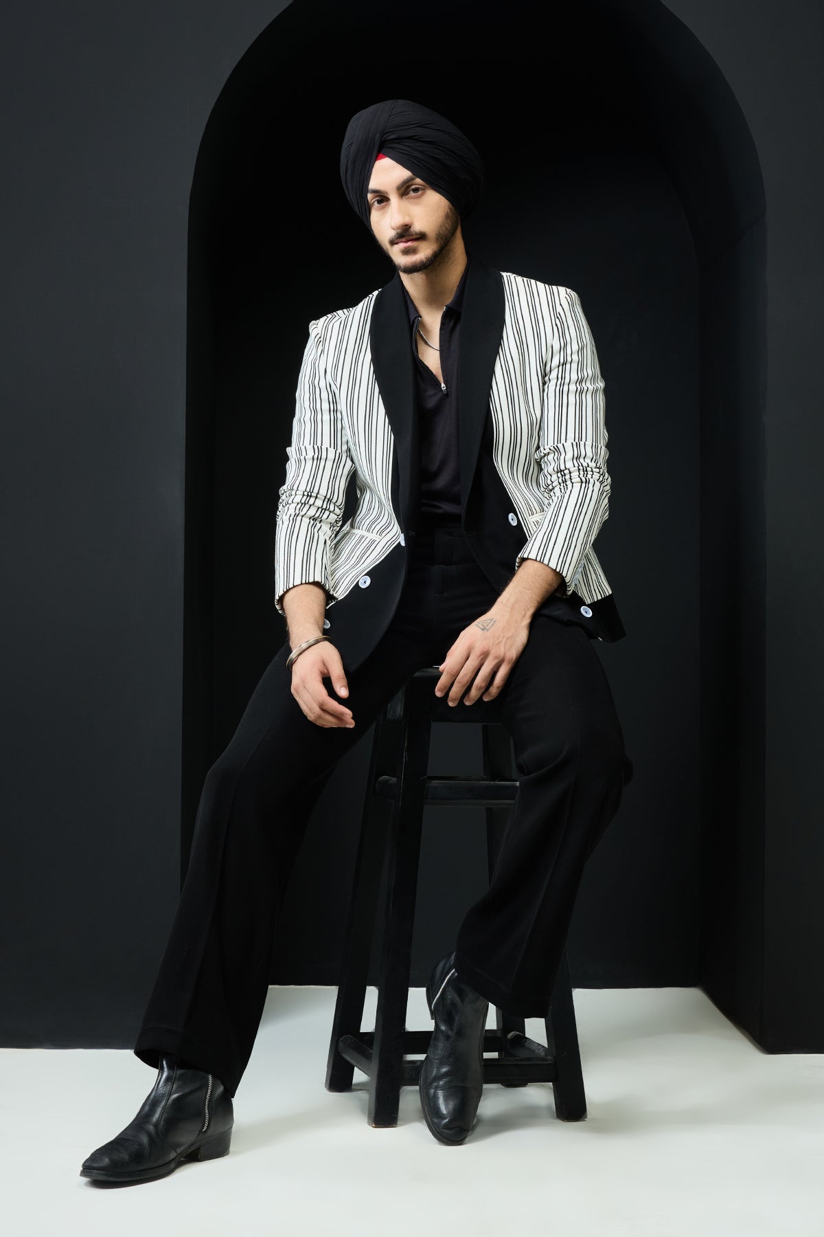 White and black strip jacket detailing with white button