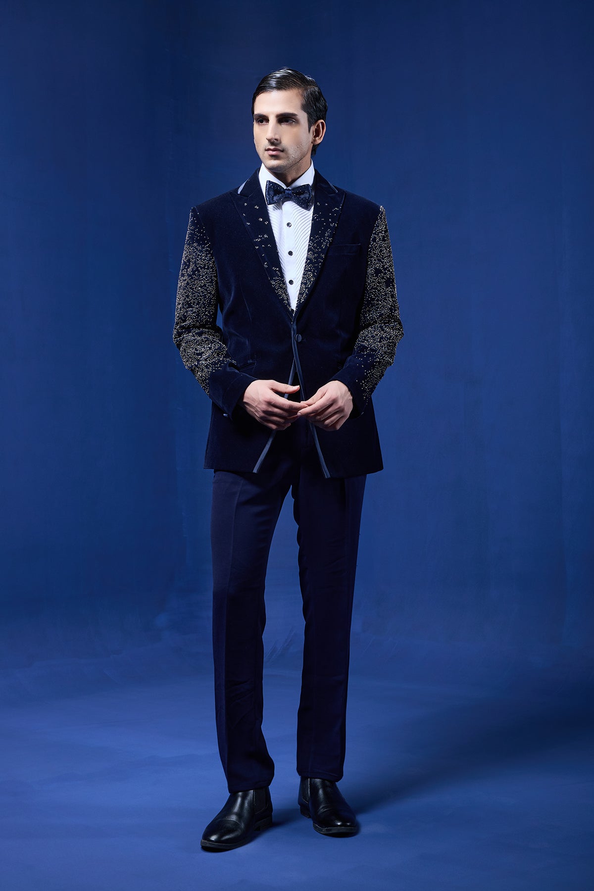 Navy Blue tuxedo highlighted with pearls and sequins
