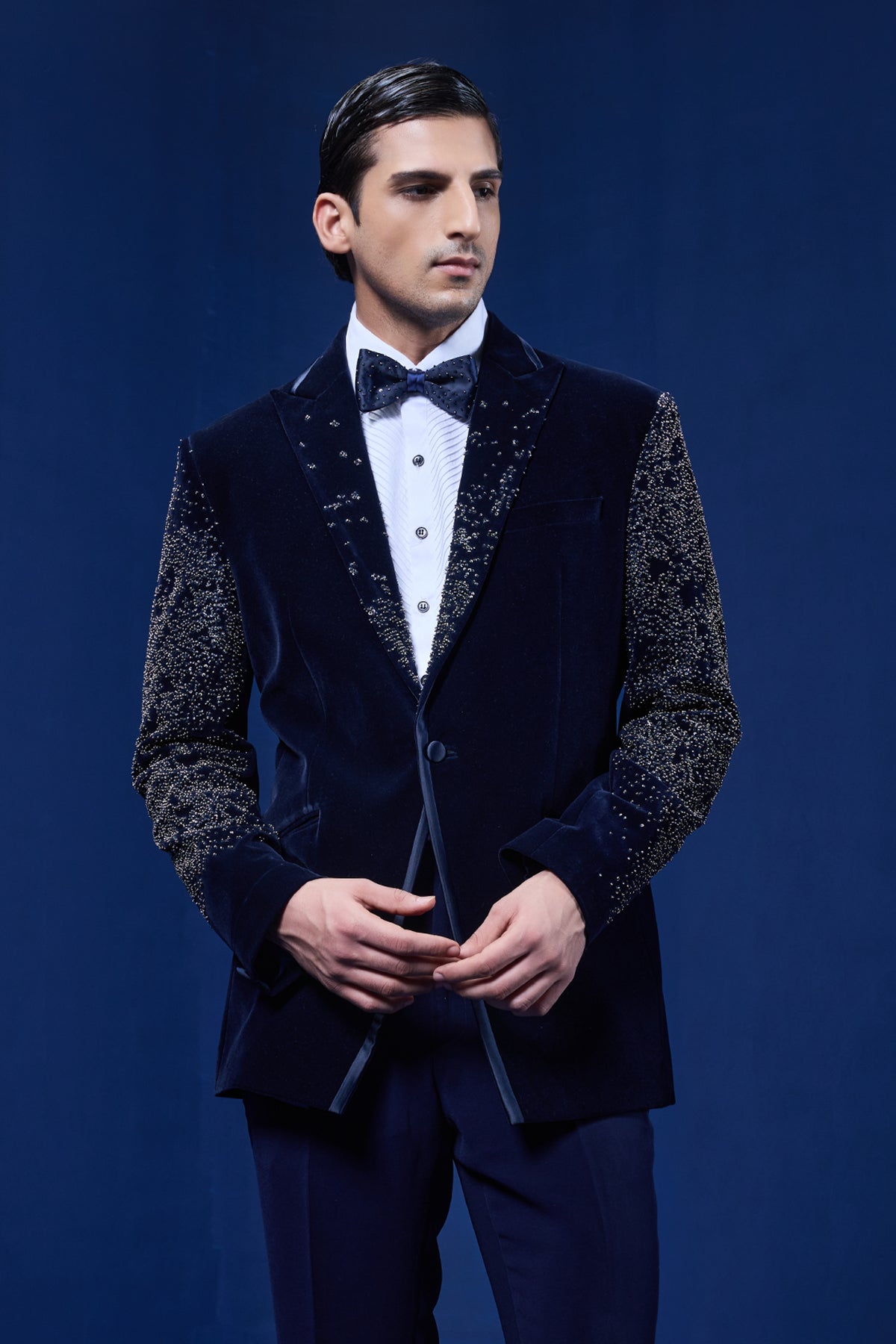 Navy Blue tuxedo highlighted with pearls and sequins