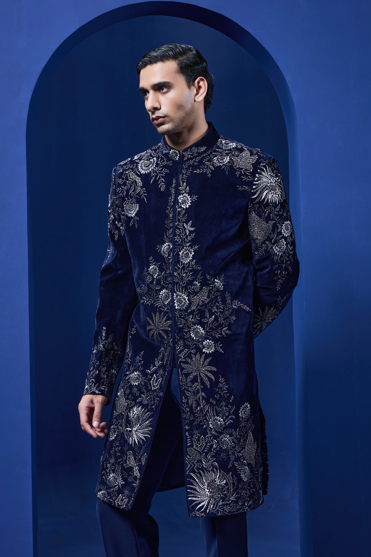 Navy blue Indo Western highlighted with silver zari pearl and cutdana