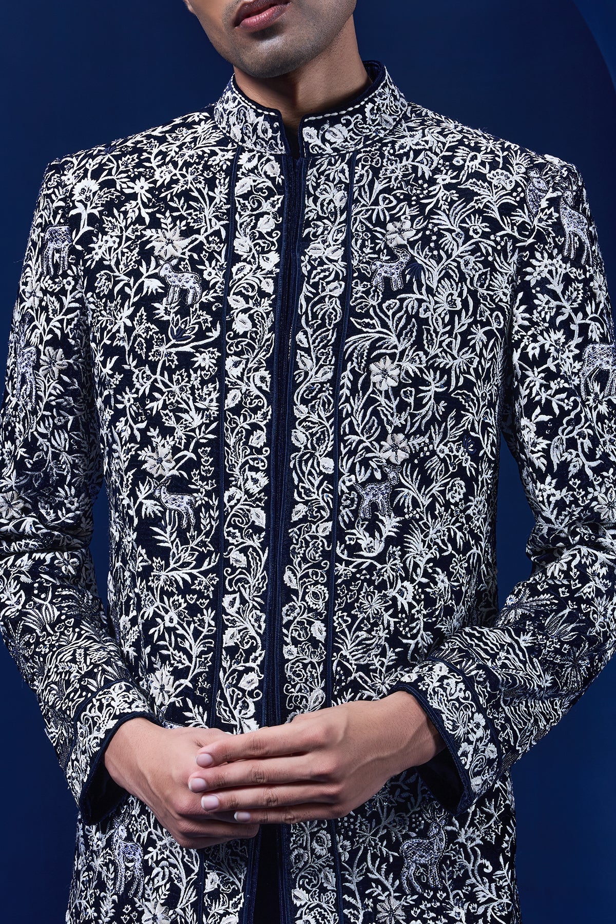 Navy blue Indo Western highlighted with sequins pearls and thread work