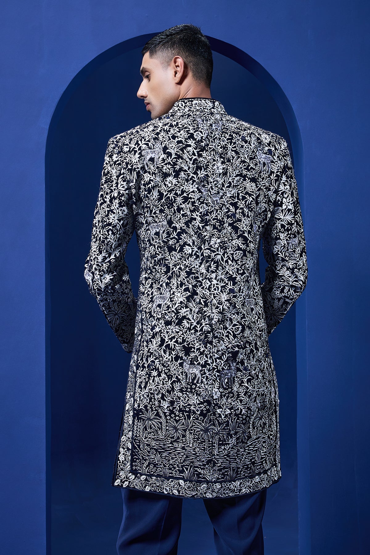 Navy blue Indo Western highlighted with sequins pearls and thread work