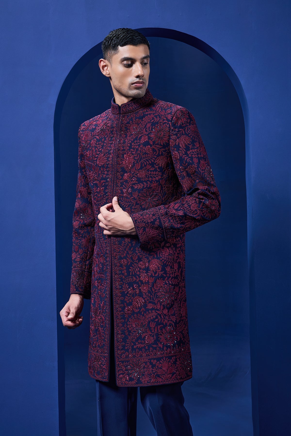 Navy blue Indo Western highlighted with sequins pearls and wine thread work