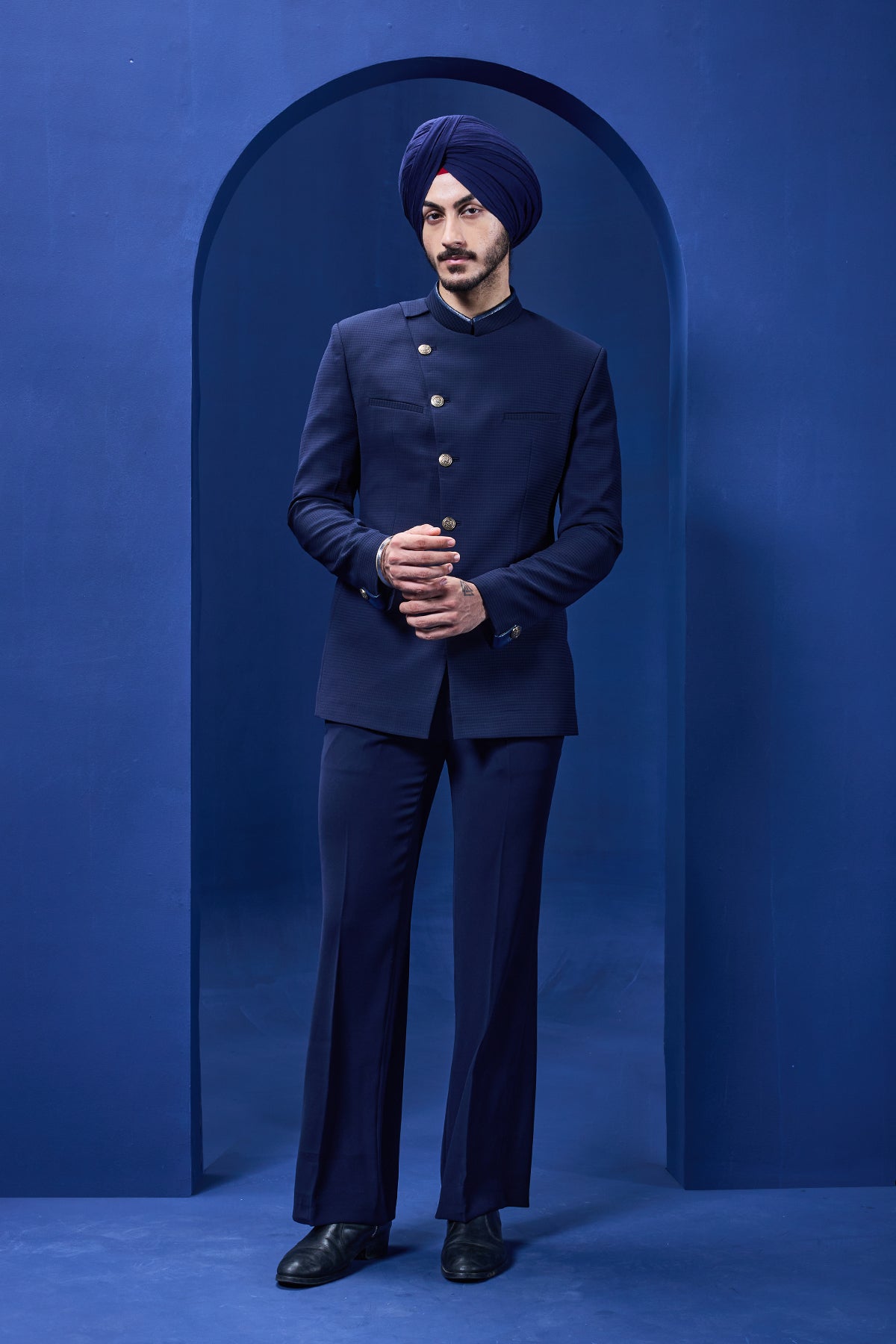 Navy blue bandhgala detailing with golden button satin taping