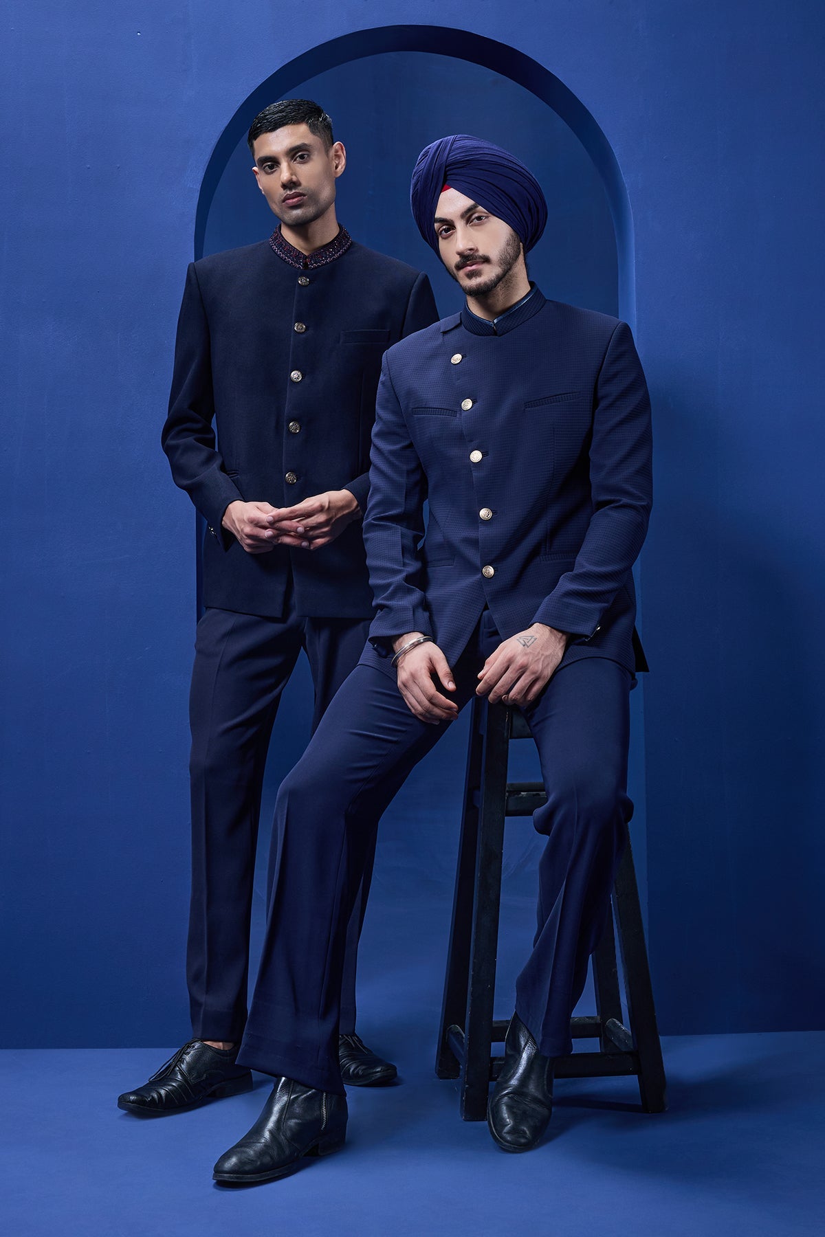 Navy blue bandhgala detailing with golden button satin taping