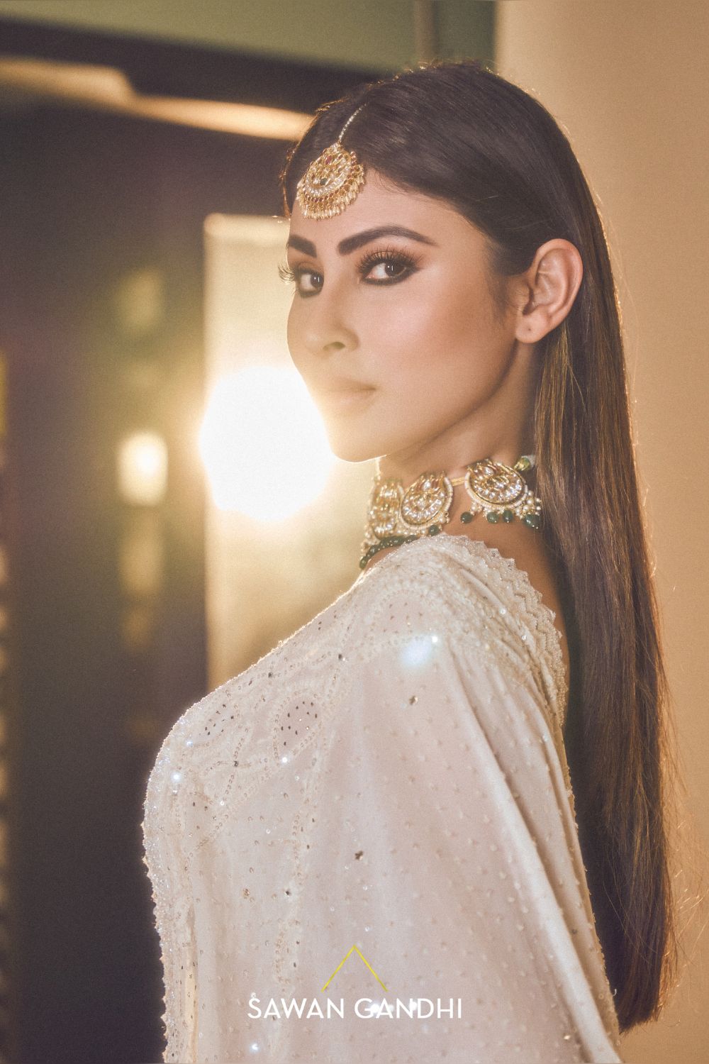 Mouni Roy in Ivory sequins lehnga set