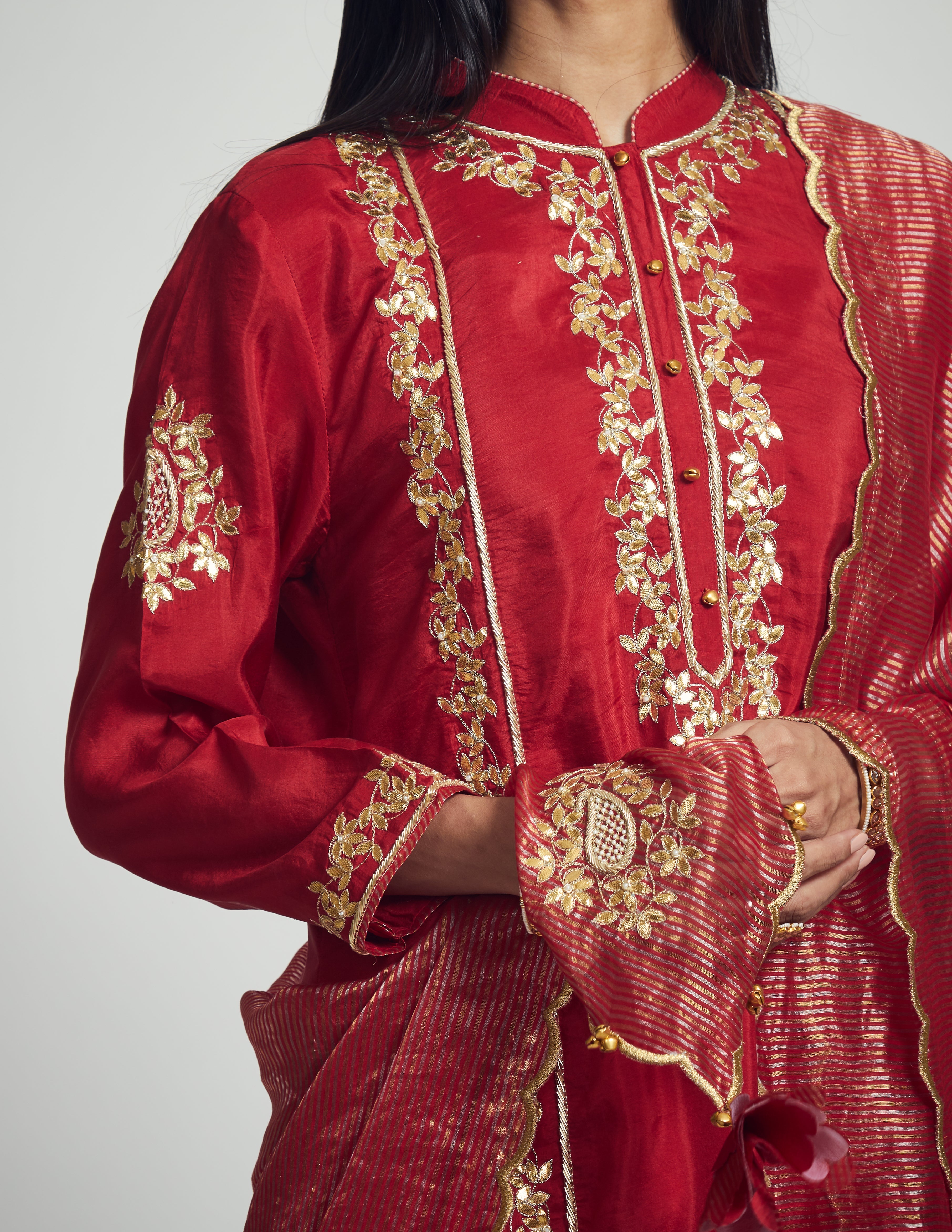 Nasira- Deep red habutai silk Gota patti embroidered kurta with garara and dupatta