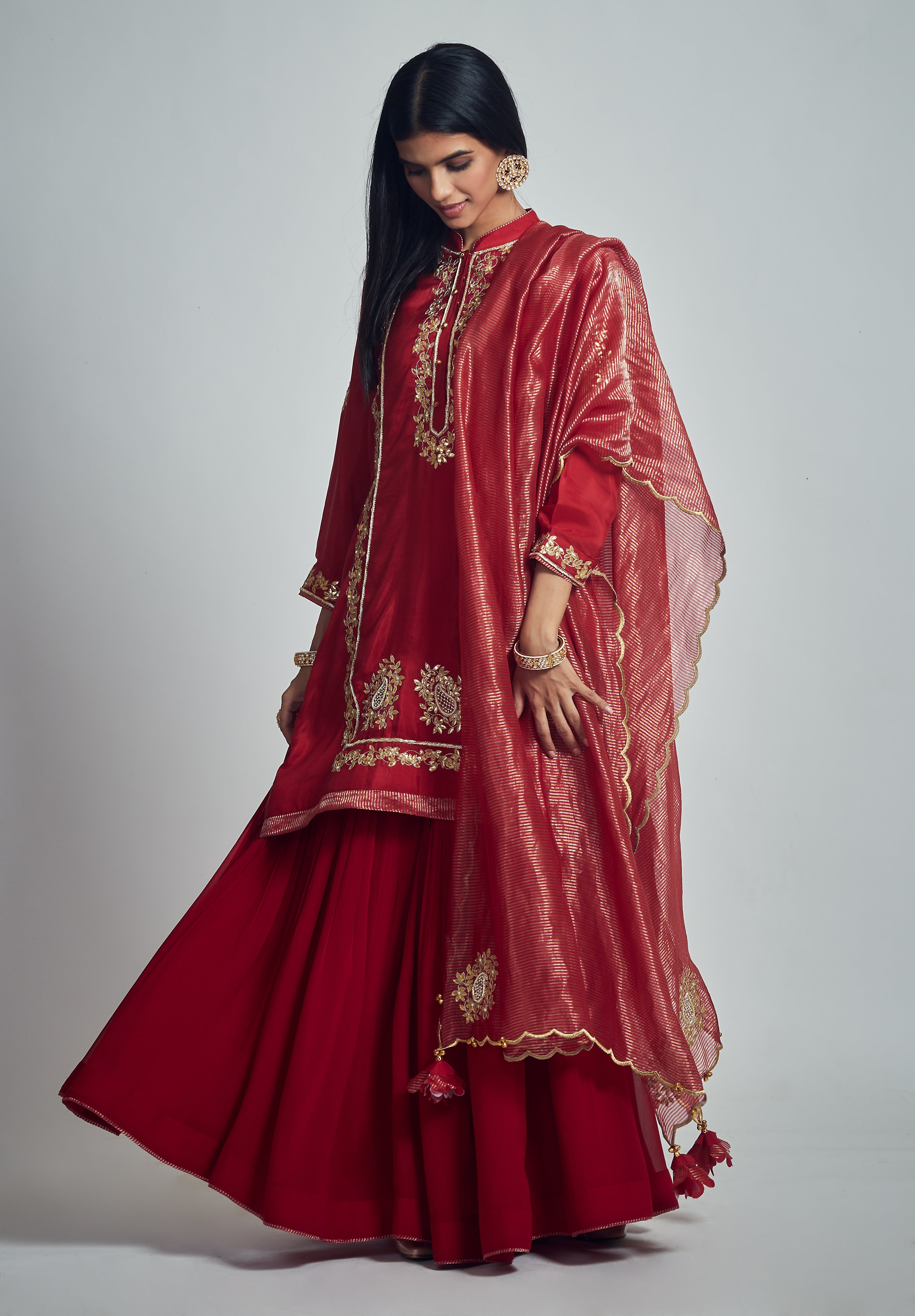 Nasira- Deep red habutai silk Gota patti embroidered kurta with garara and dupatta