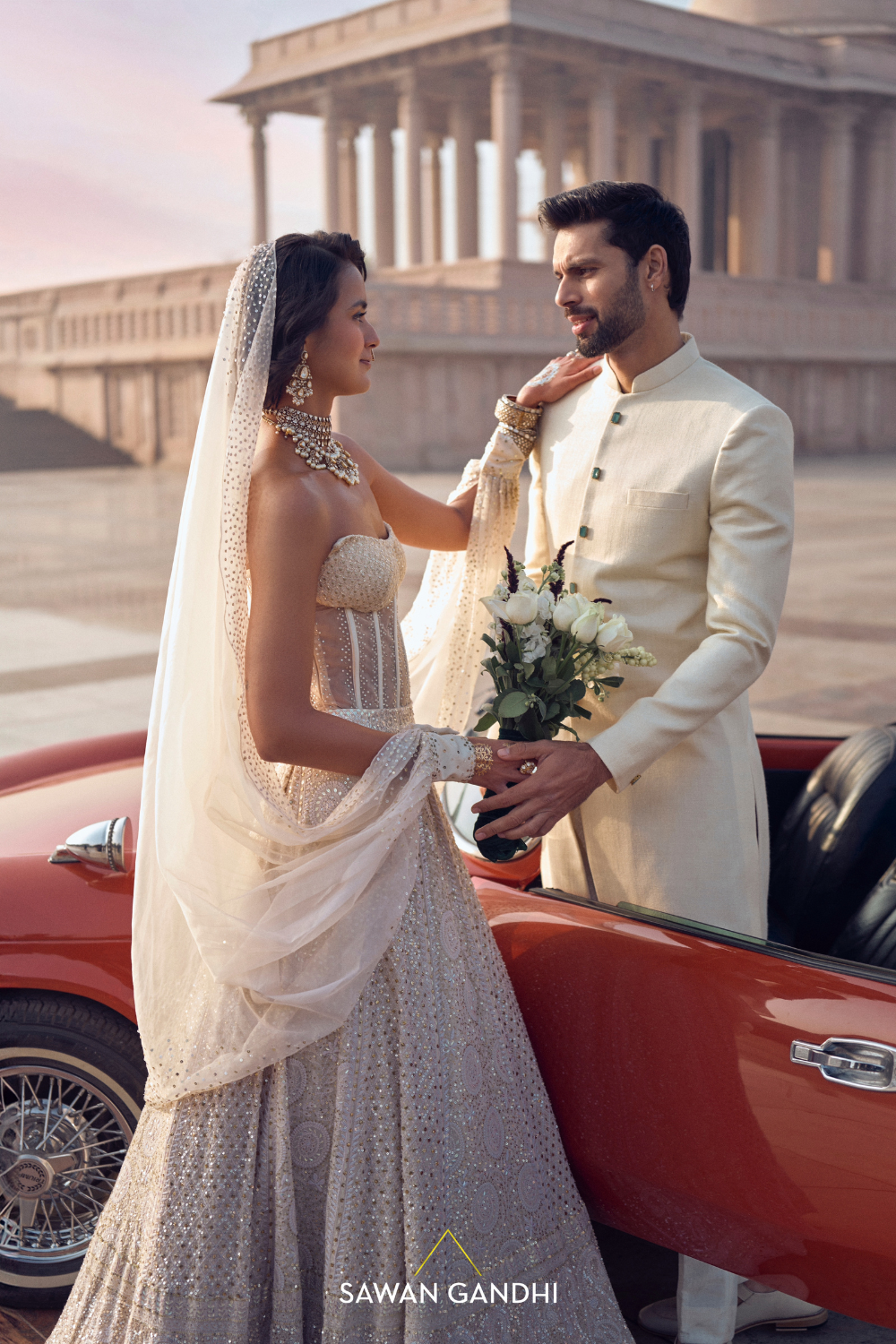 IVORY SHERWANI WITH EMERALD ACCENTS