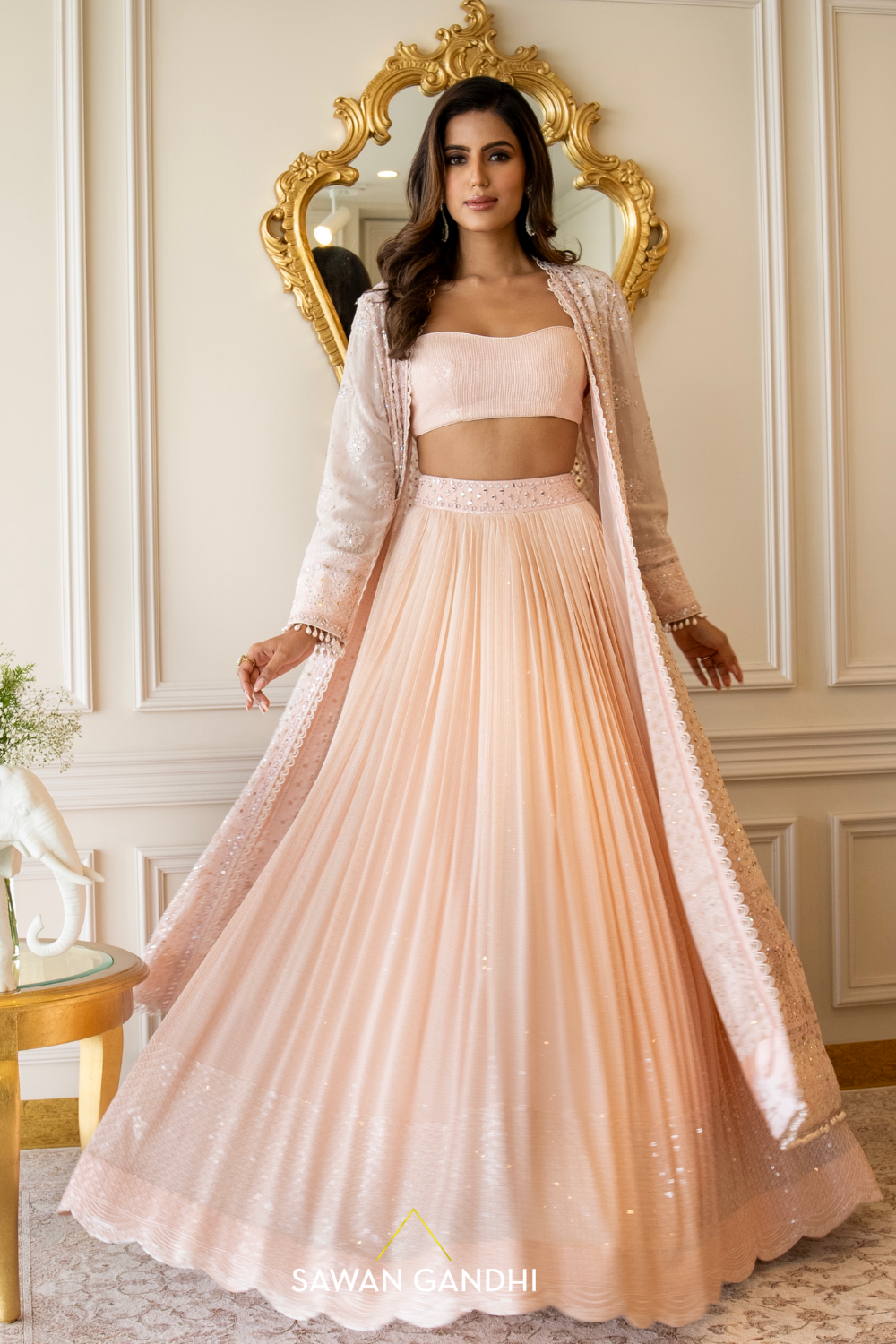 Peach sequins lehenga with Chikankari cape