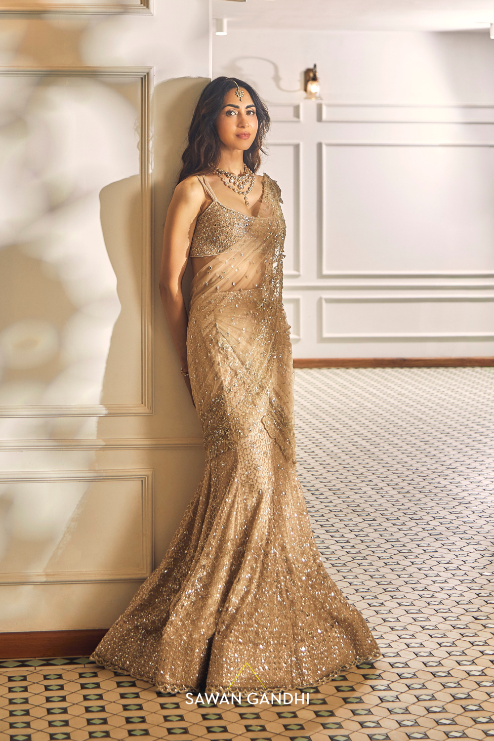 Priya abraham in Beige gold fishcut drape saree