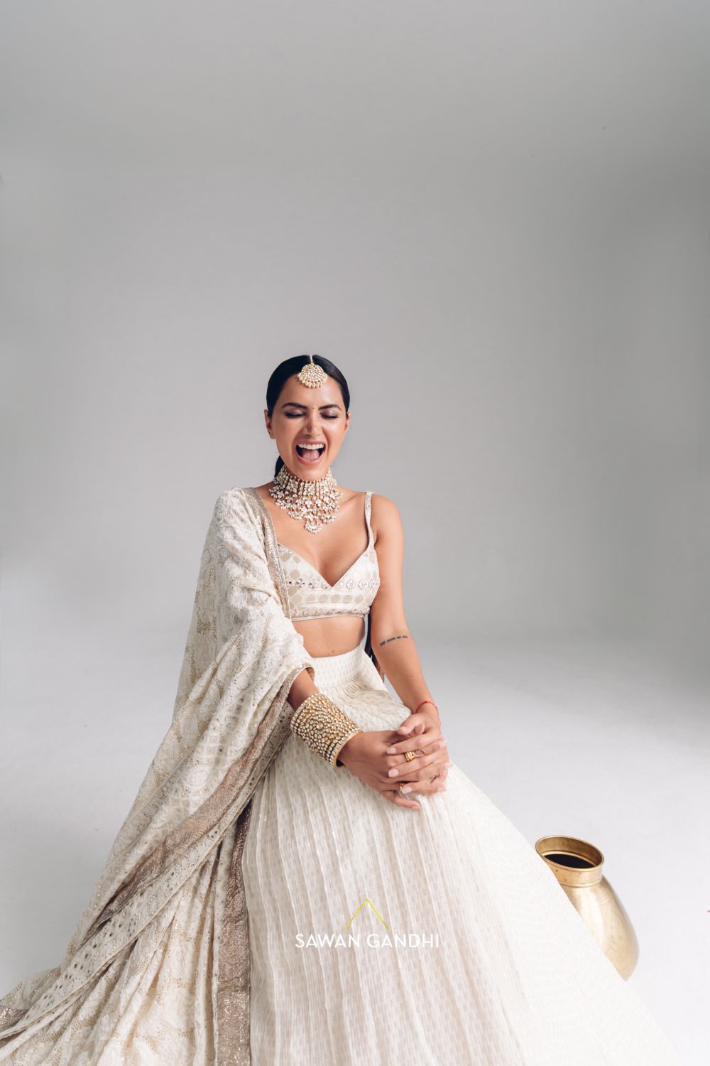 Diipa Khosla in Ivory georgette lehenga