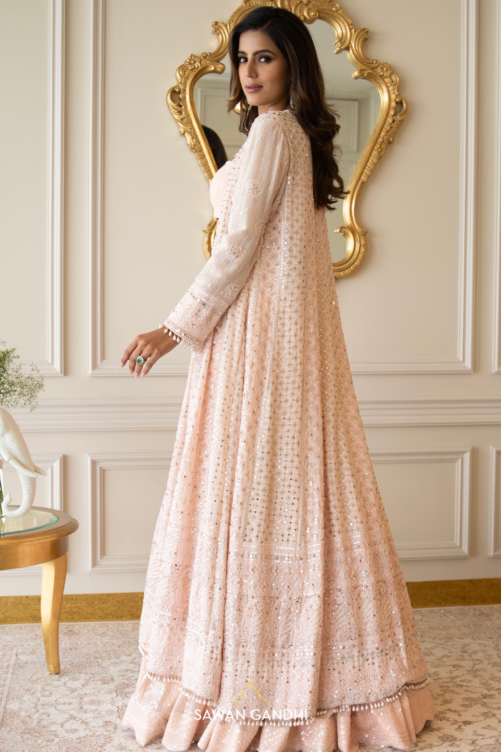 Peach sequins lehenga with Chikankari cape