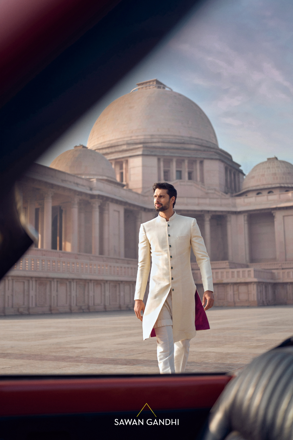 IVORY SHERWANI WITH EMERALD ACCENTS