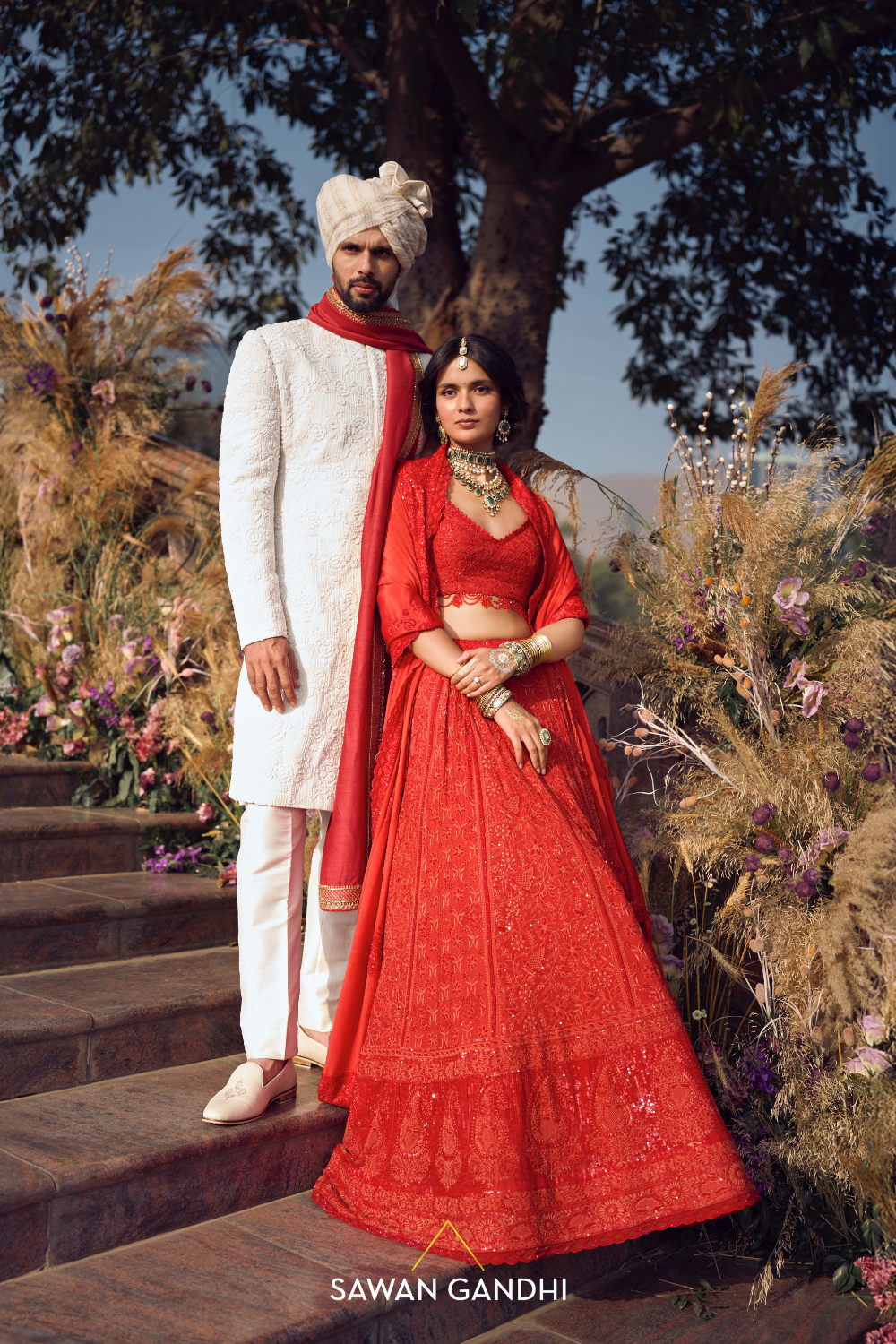 THE ORANGE-RED CHIKANKARI LEHENGA