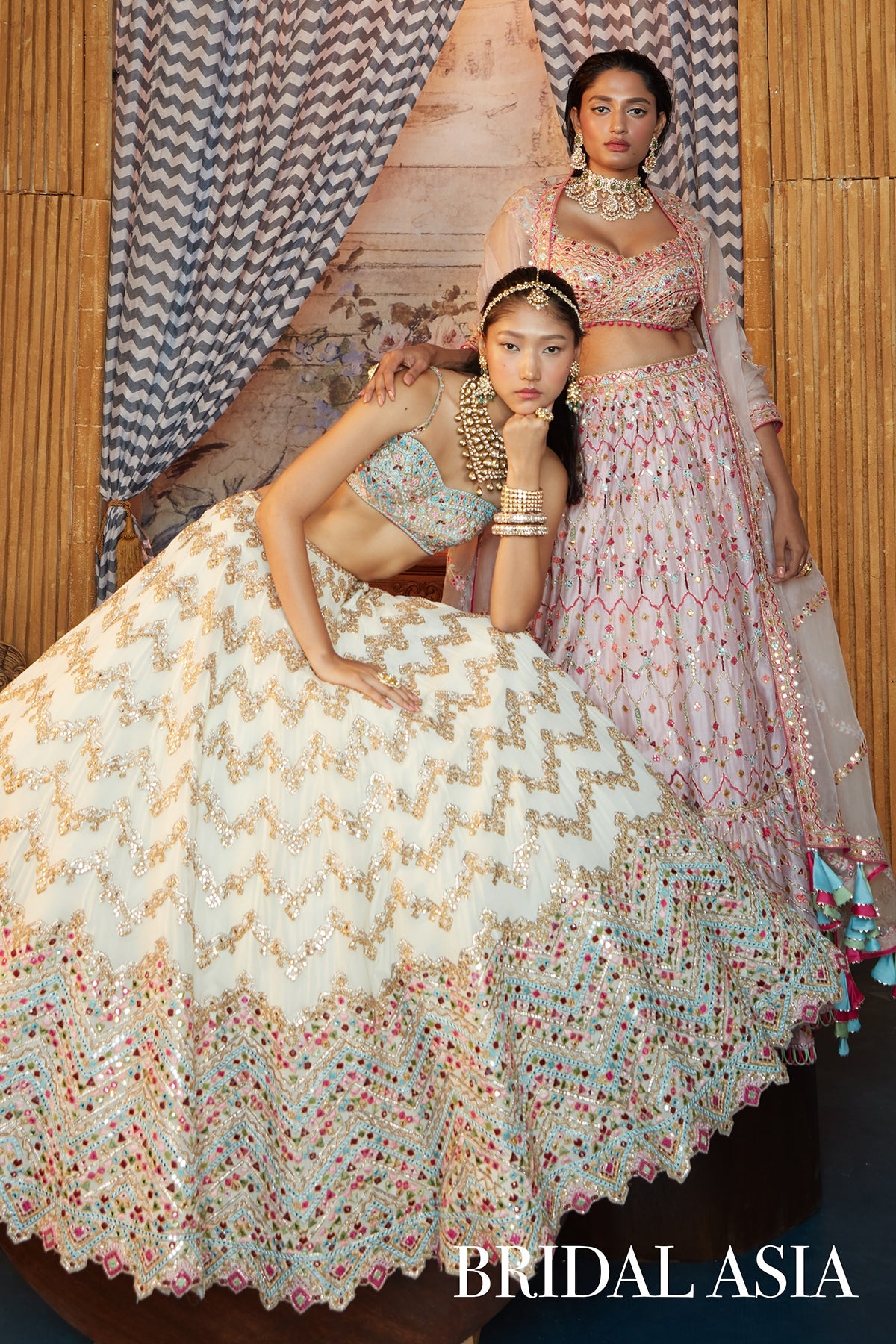 Ivory Georgette Chevron Embroidered Lehenga Paired With A Blue Blouse And Organza Dupatta