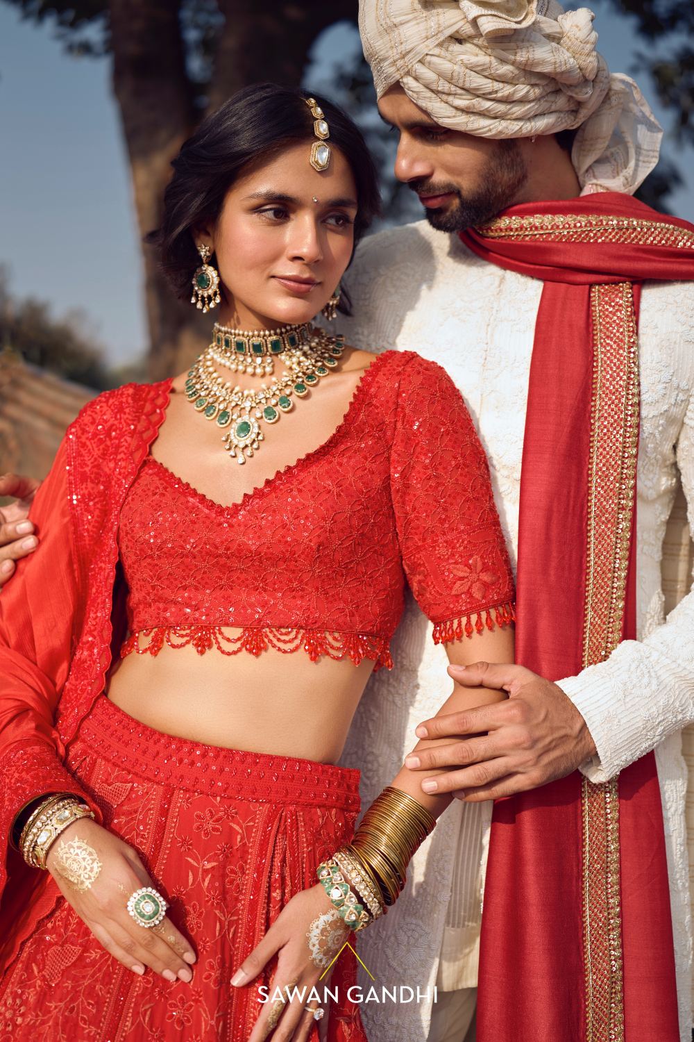 THE ORANGE-RED CHIKANKARI LEHENGA