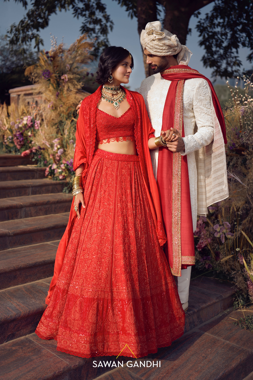 THE ORANGE-RED CHIKANKARI LEHENGA