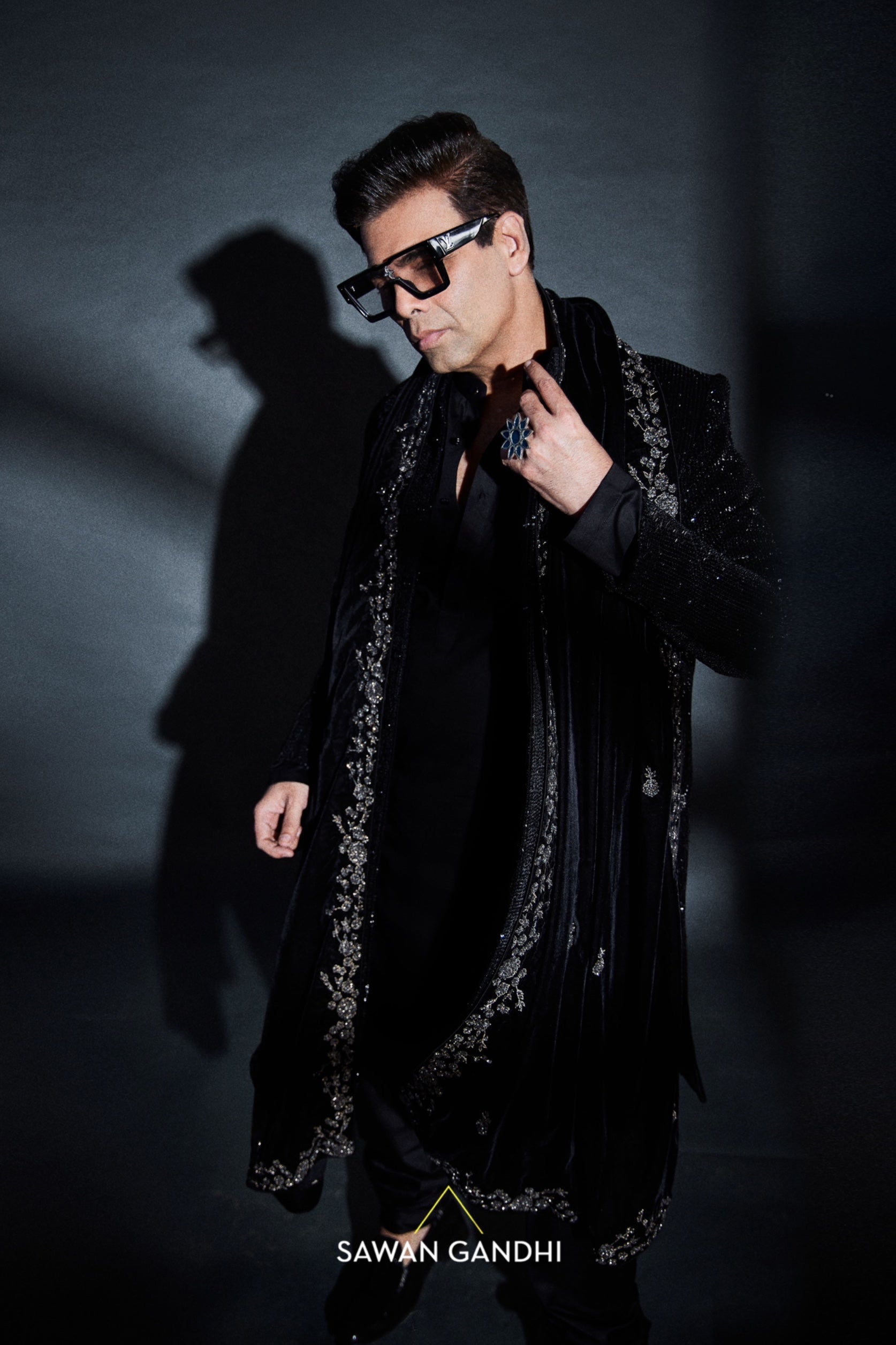 Karan Johar in Black sequins sherwani with stole