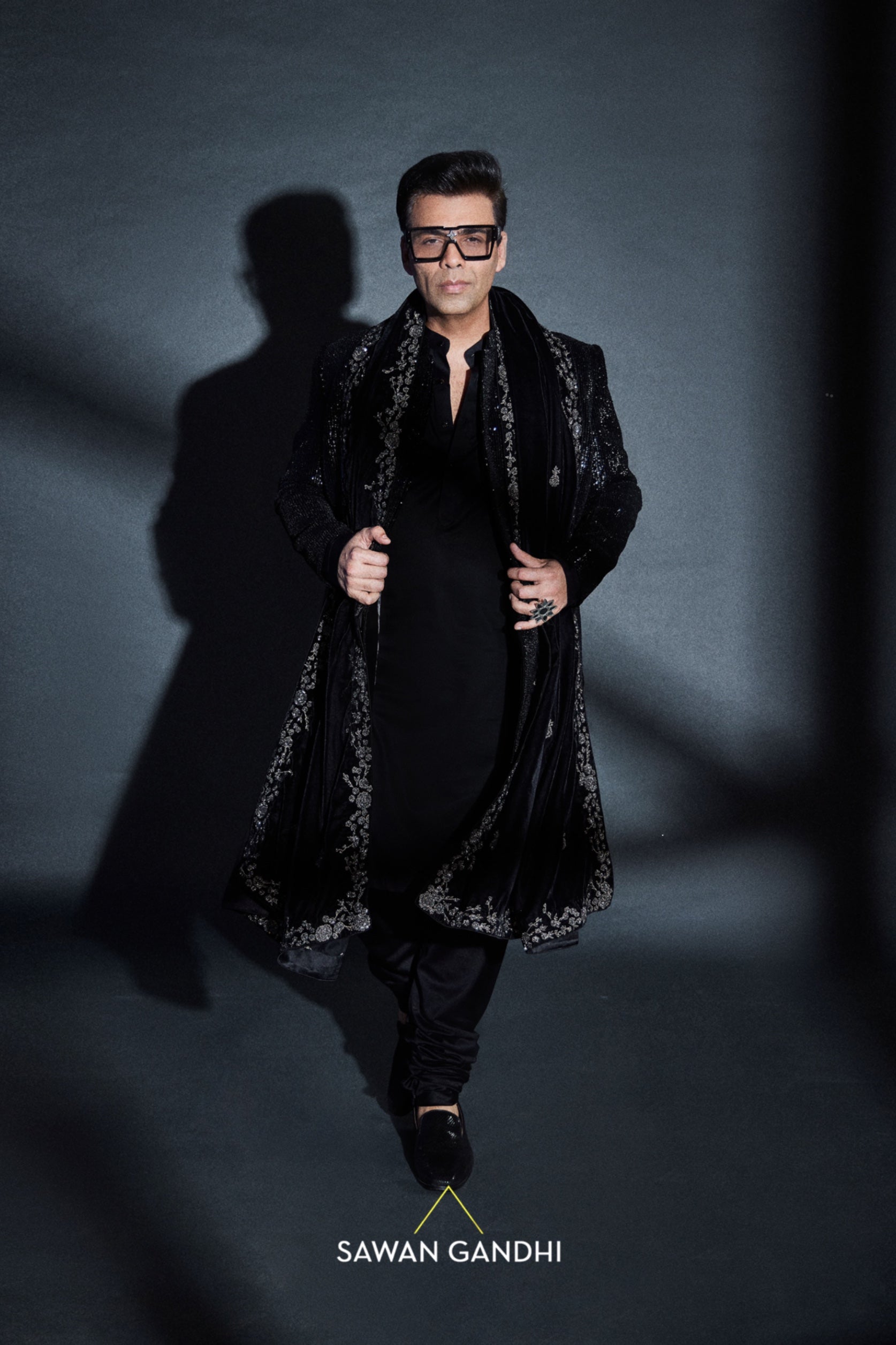 Karan Johar in Black sequins sherwani with stole