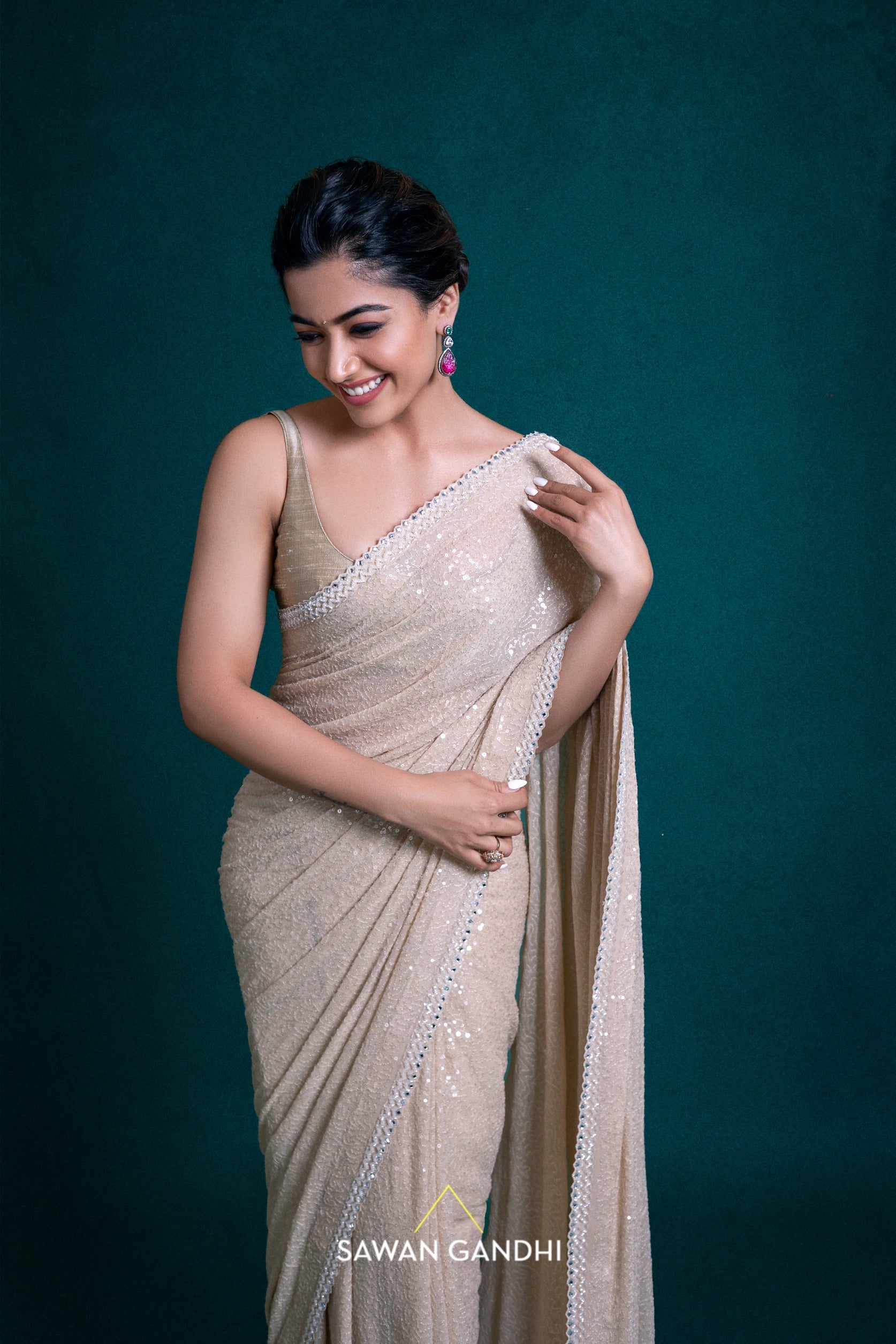 Rashmika Mandanna in Beige Sequins Saree .