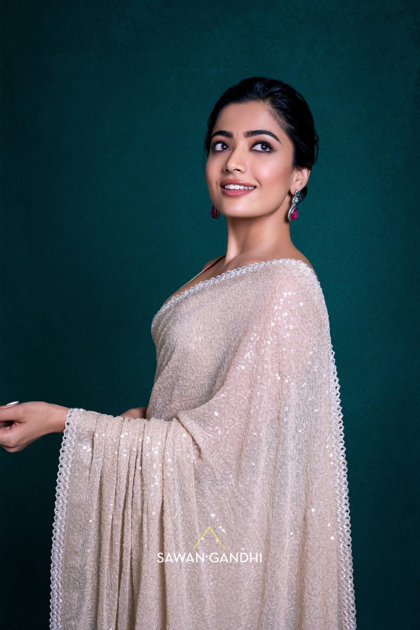 Rashmika Mandanna in Beige Sequins Saree .