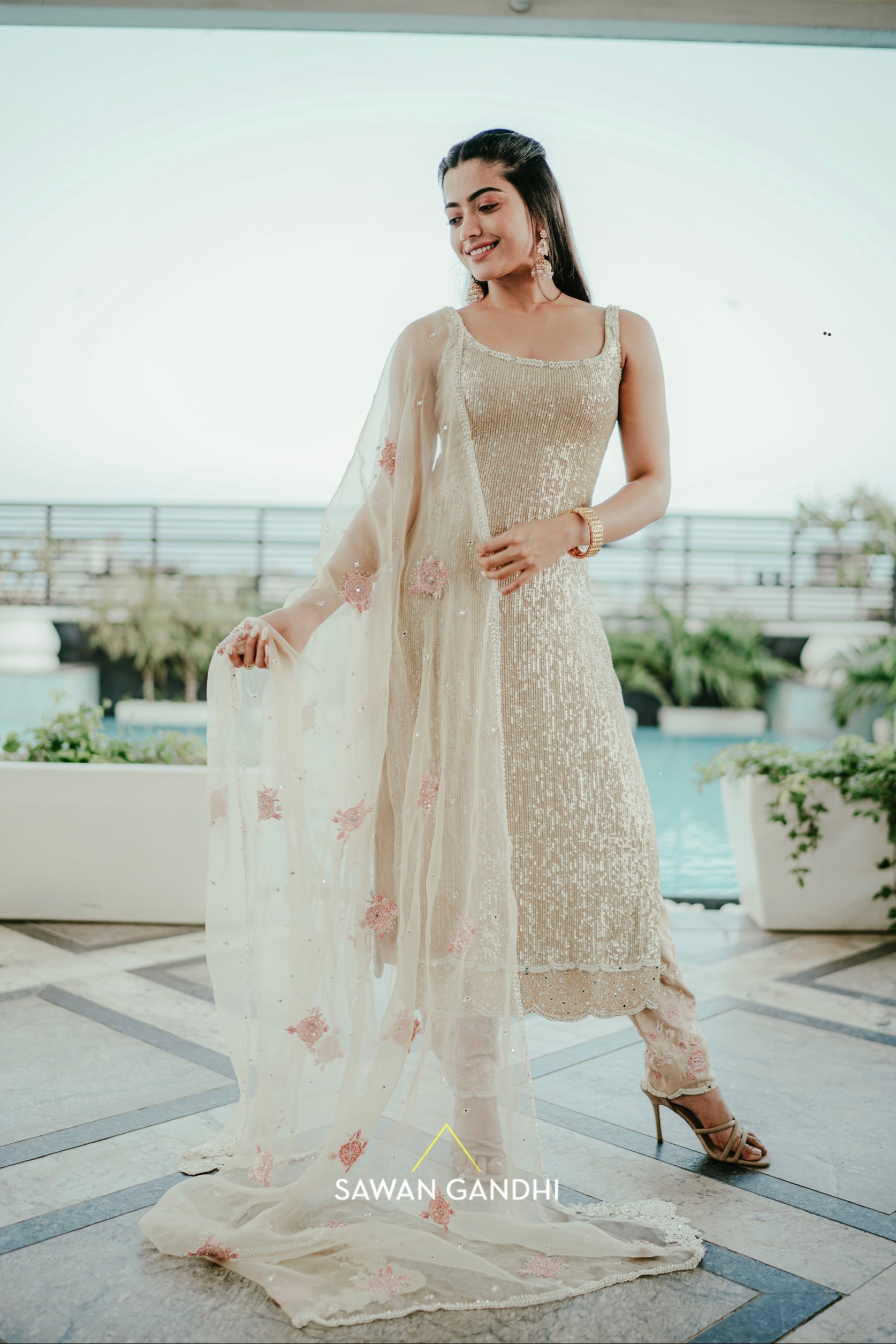 Rashmika Mandanna in Gold sequins suit