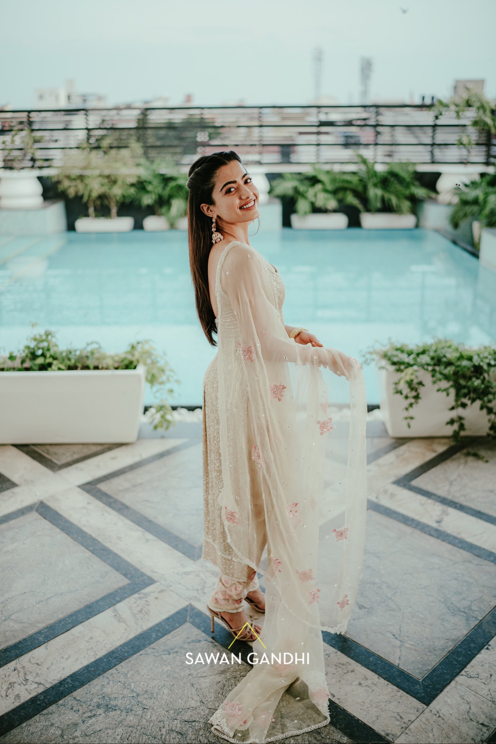 Rashmika Mandanna in Gold sequins suit