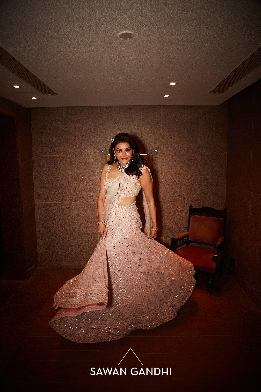 Kajal aggarwal in peach mirror work lehenga set